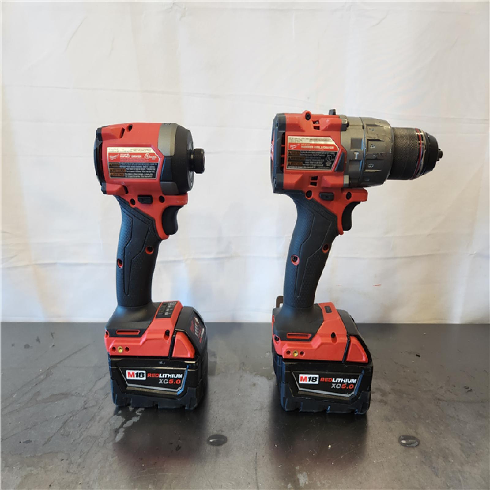 AS-IS- Milwaukee FUEL 18V Lithium-Ion Brushless Cordless Hammer Drill and Impact Driver Combo Kit