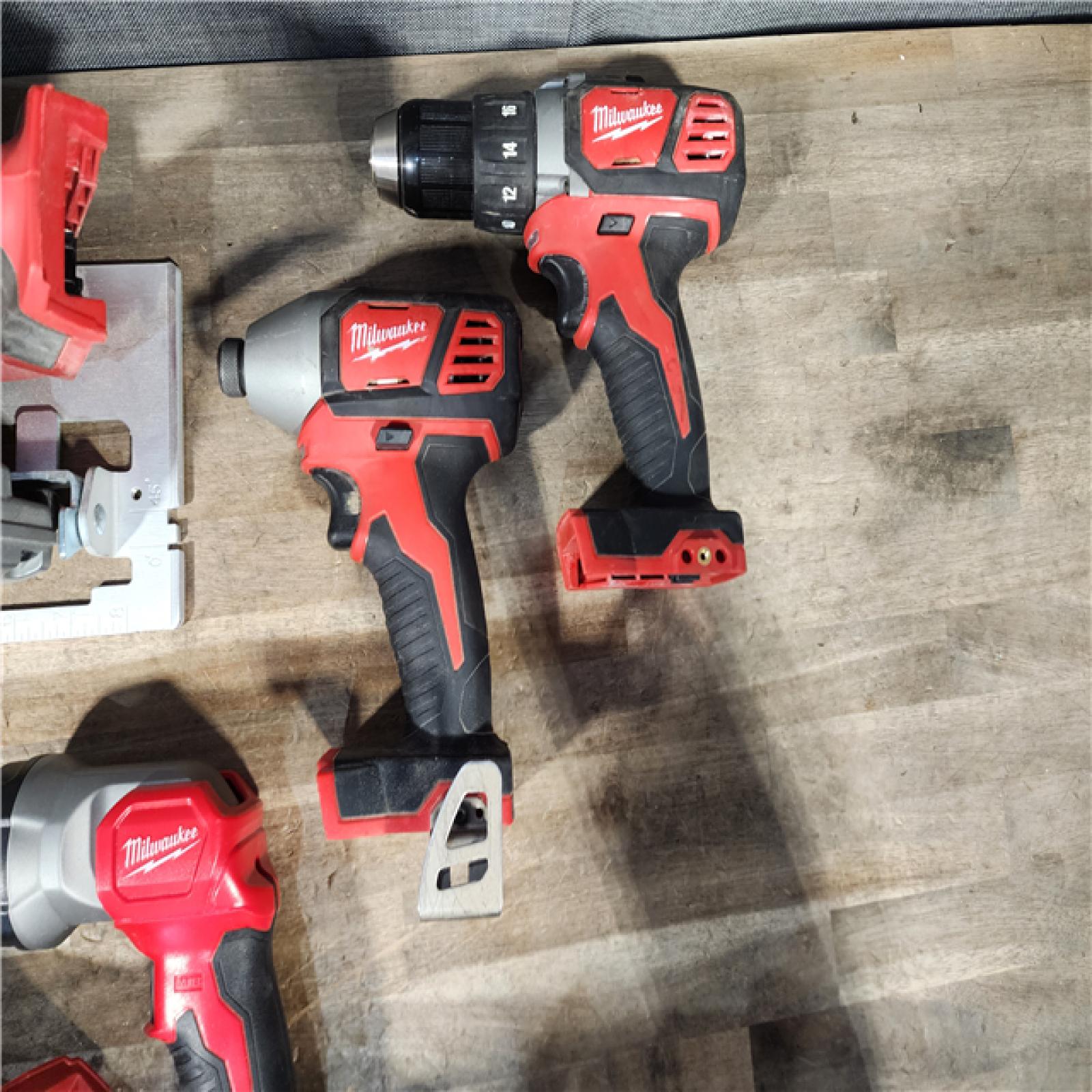 HOUSTON LOCATION - AS-IS Milwaukee M18 18-Volt Lithium-Ion Cordless Combo Tool Kit (5-Tool) with (1) 3.0Ah and (1) 1.5Ah Battery  (1) Charger  (1) Tool Bag