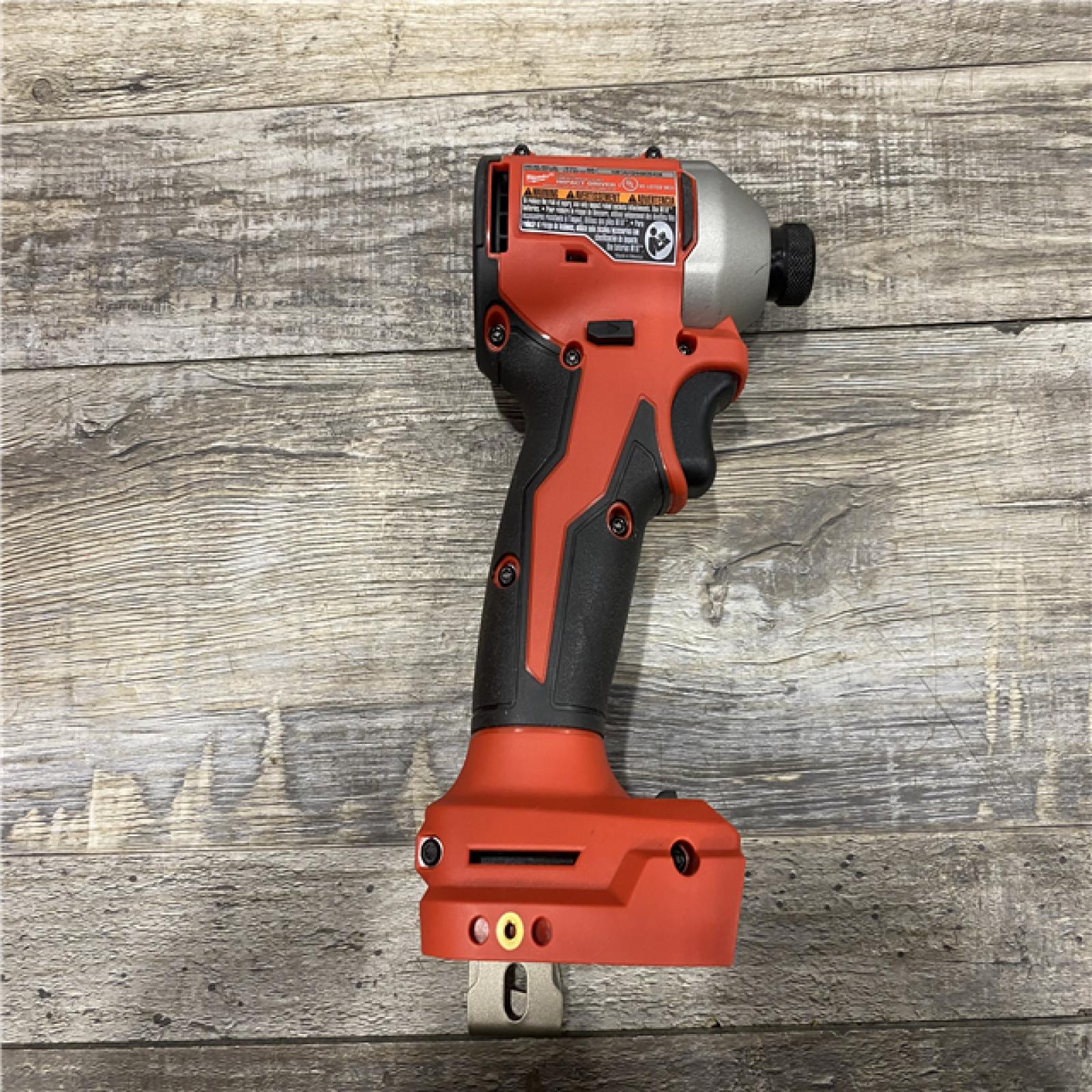 AS-IS Milwaukee 18V Lithium-Ion Compact Brushless Cordless 1/4 in. Impact Driver (Tool-Only)