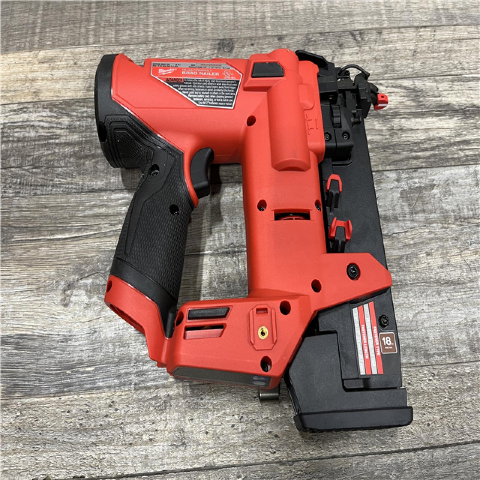 AS-IS Milwaukee FUEL 12-Volt Lithium-Ion Brushless Cordless 18-Gauge 1-1/2 in. Compact Brad Nailer (Tool-Only)