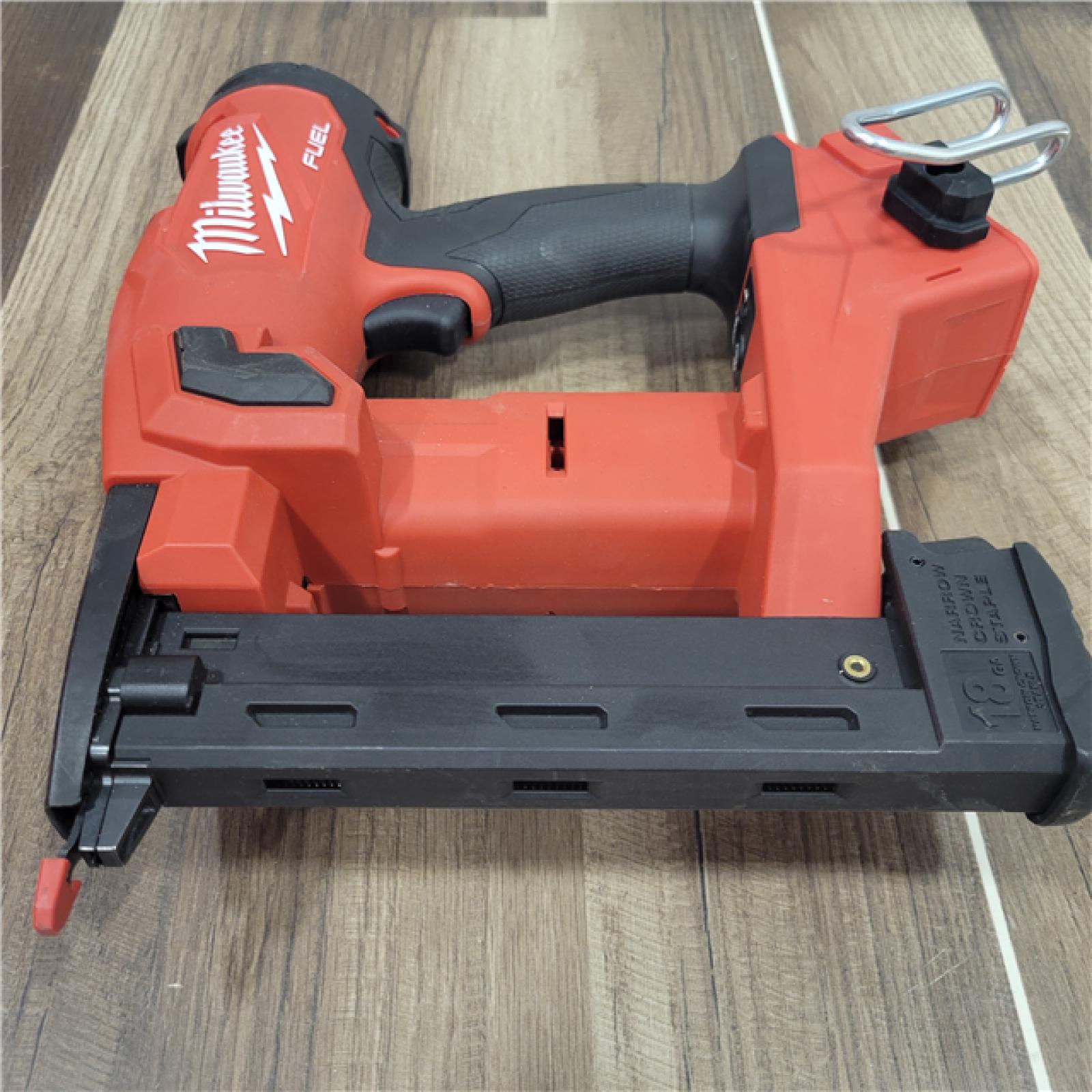 AS-IS  MILWAUKEE M18 FUEL 18-Volt Lithium-Ion Brushless Cordless 18-Gauge 1/4 in. Narrow Crown Stapler (Tool-Only)