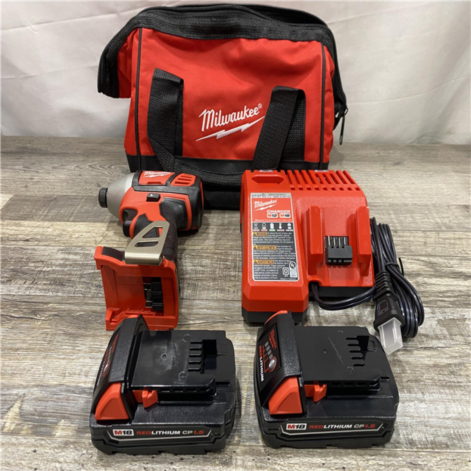 AS-IS Milwaukee 18-Volt Lithium-Ion Cordless 1/4 in. Impact Driver Kit
