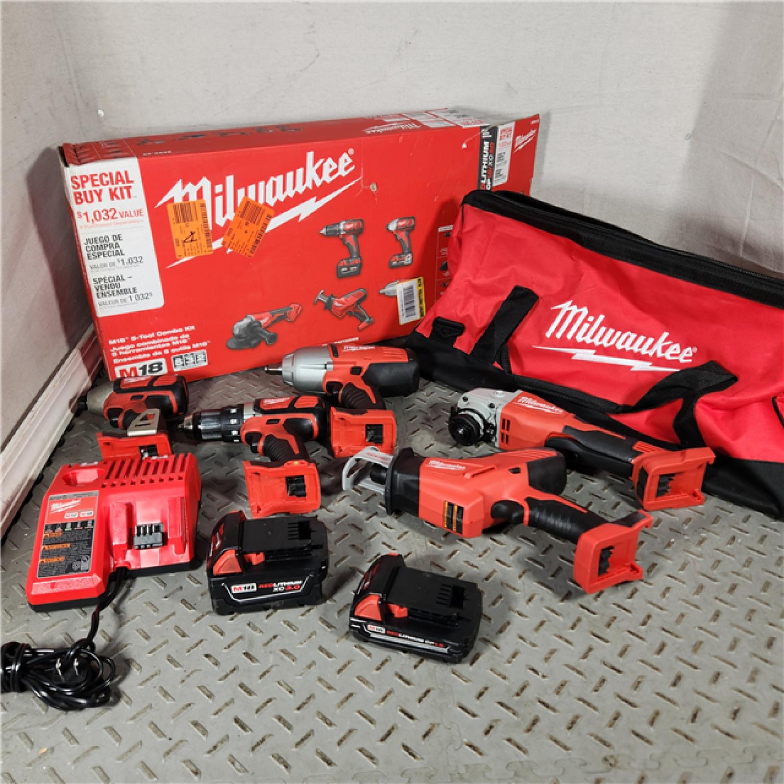 Houston location- AS-IS Milwaukee 5 TOOL Combo Kit Appears in new condition