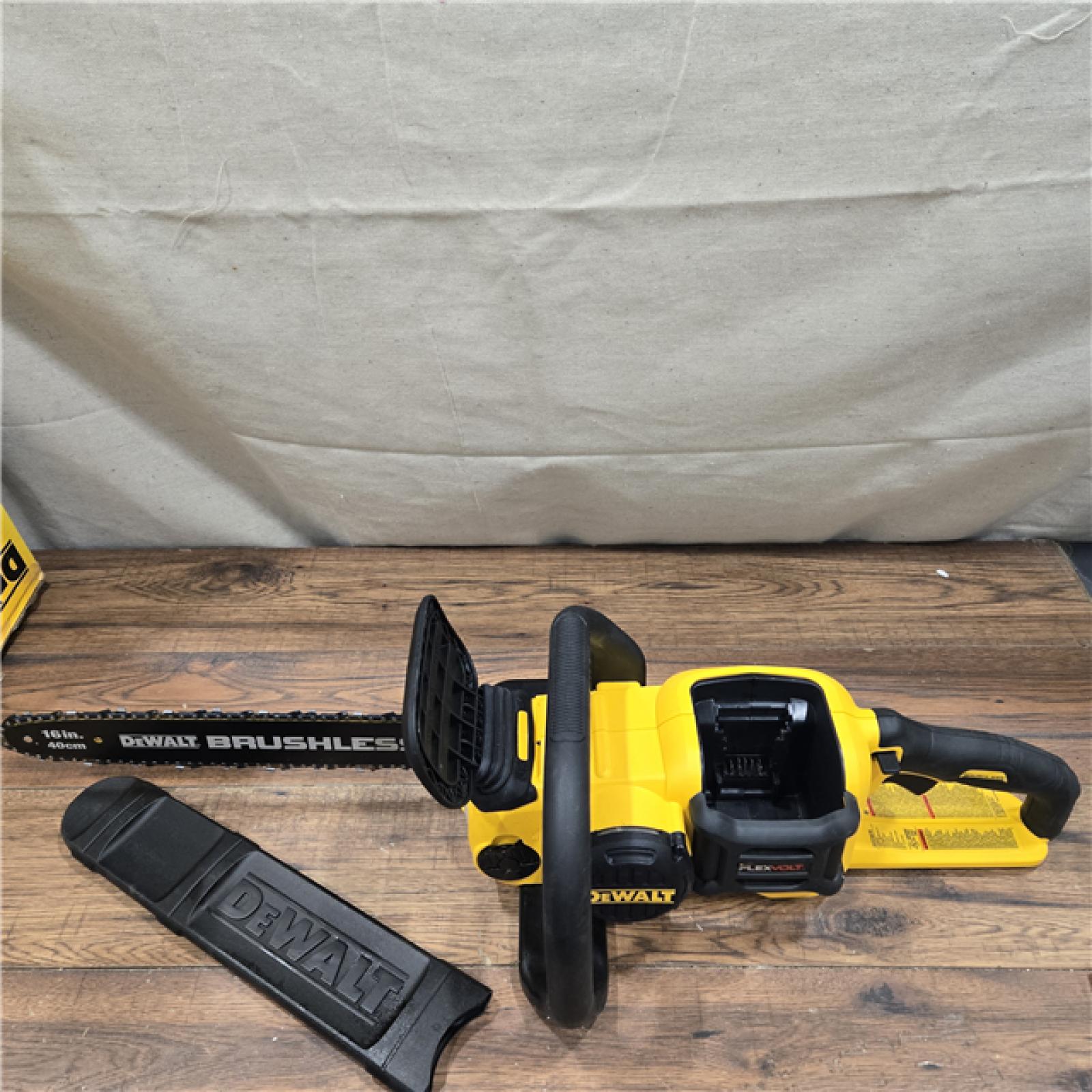 AS-IS DEWALT FLEXVOLT 60V MAX 16in. Brushless Cordless Battery Powered Chainsaw Kit with (1) FLEXVOLT 2 Ah Battery & Charger