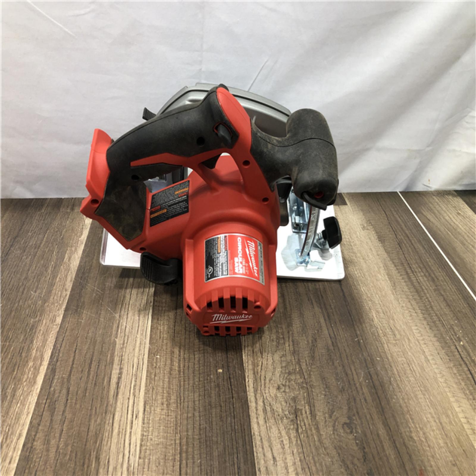 AS-IS Milwaukee M18 18V Lithium-Ion Cordless 6-1/2 in. Circular Saw (Tool-Only)