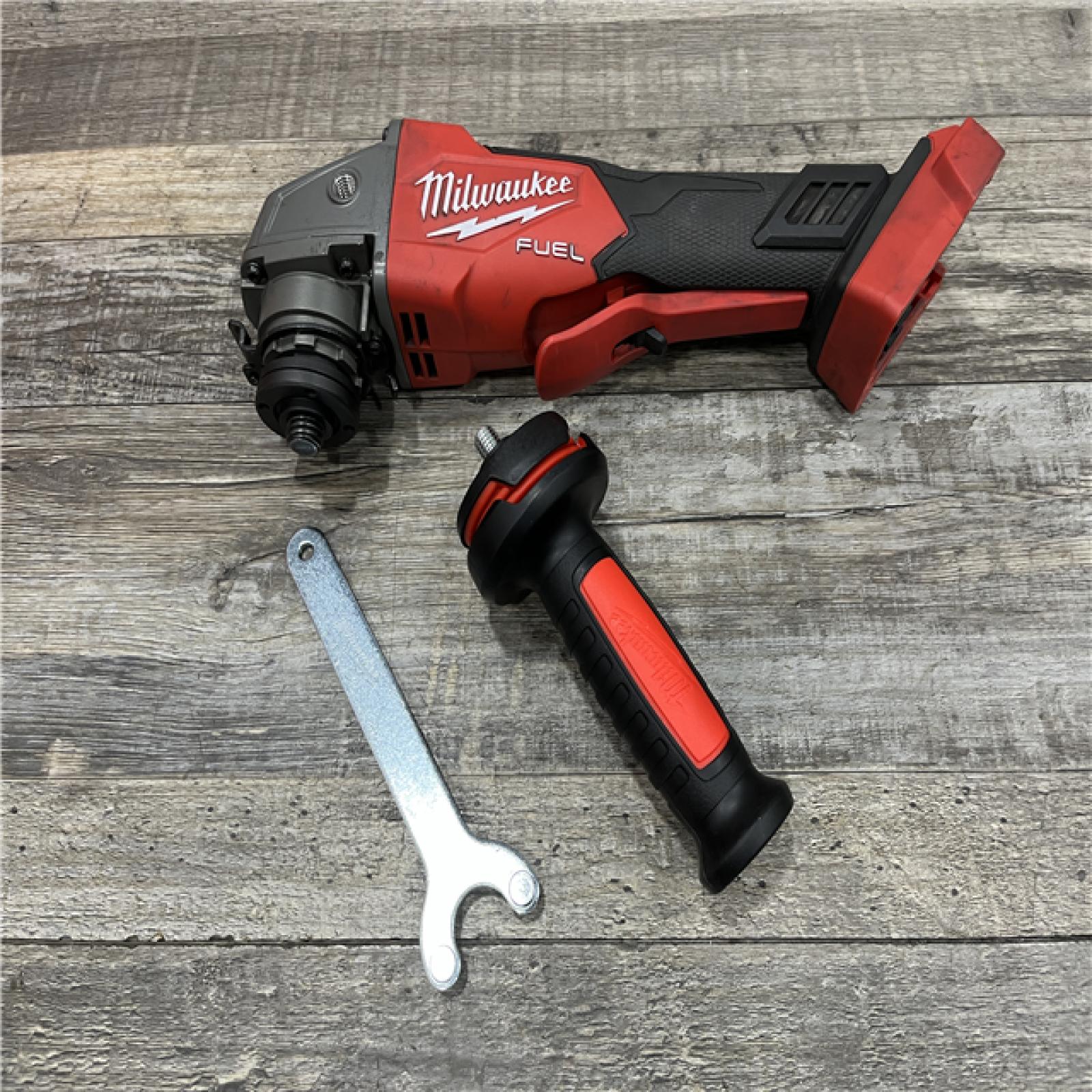 AS-IS Milwaukee FUEL 18V Lithium-Ion Brushless Cordless 4-1/2 in./5 in. Grinder w/Paddle Switch (Tool-Only)