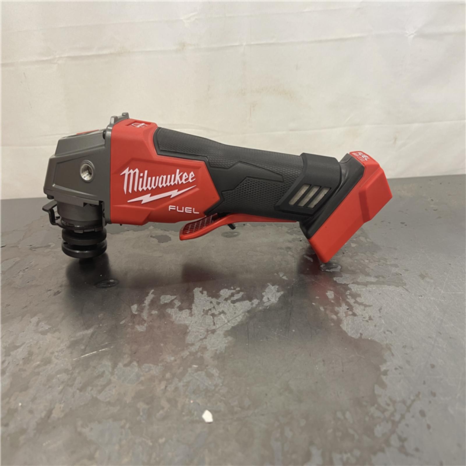 AS-IS- Milwaukee FUEL 18-Volt Lithium-Ion Brushless Cordless 4-1/2 in./5 in. Grinder W/Paddle Switch (Tool-Only)