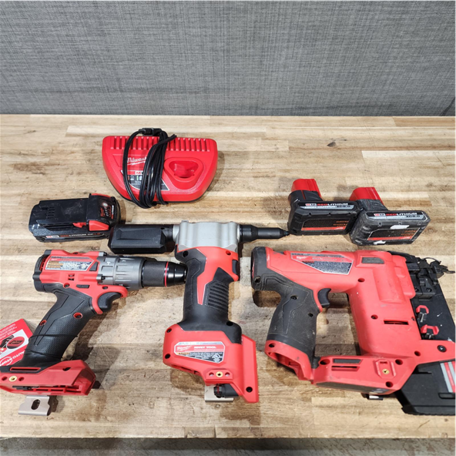 Houston Location AS-IS Milwaukee Drill and Nail Gun and Rivet Tool and Batteries 3 with Charger