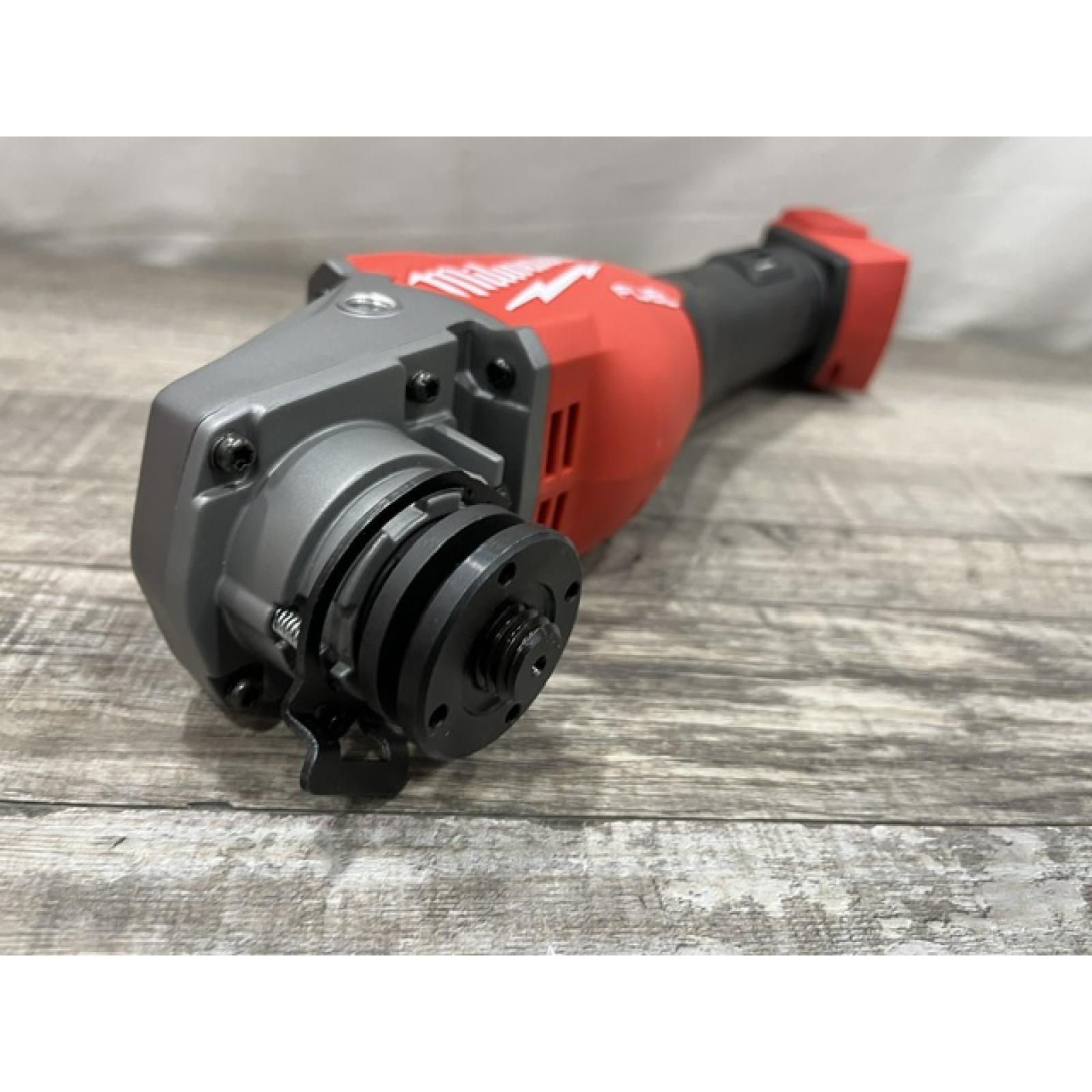 AS-IS Milwaukee FUEL 18V Lithium-Ion Brushless Cordless 4-1/2 in./6 in. Braking Grinder with Slide Switch (Tool-Only)