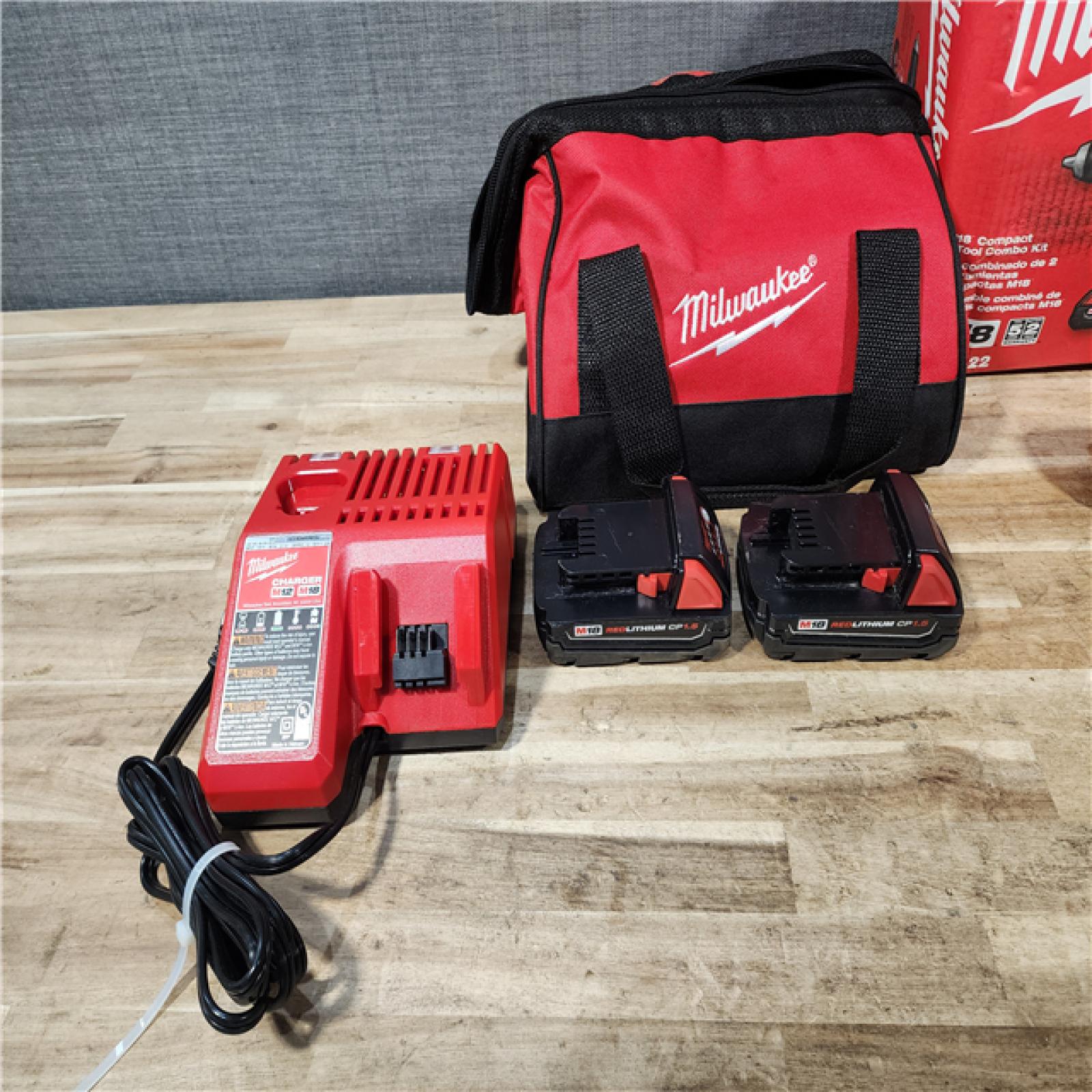 HOUSTON LOCATION - AS-IS Milwaukee 18V Lithium-Ion Cordless Drill Driver/Impact Driver Combo Kit