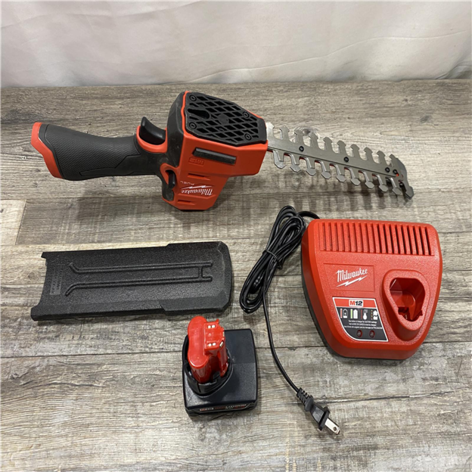 AS-IS Milwaukee FUEL 8 in. 12V Lithium-Ion Brushless Cordless Hedge Trimmer Kit