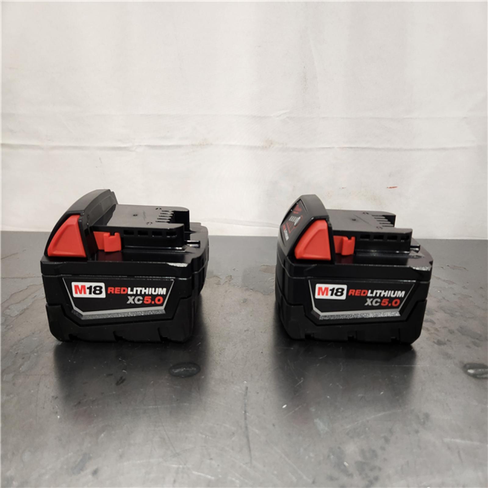 AS-IS- Milwaukee  18-Volt Lithium-Ion XC Starter Kit with Two 5.0Ah Batteries and Charger