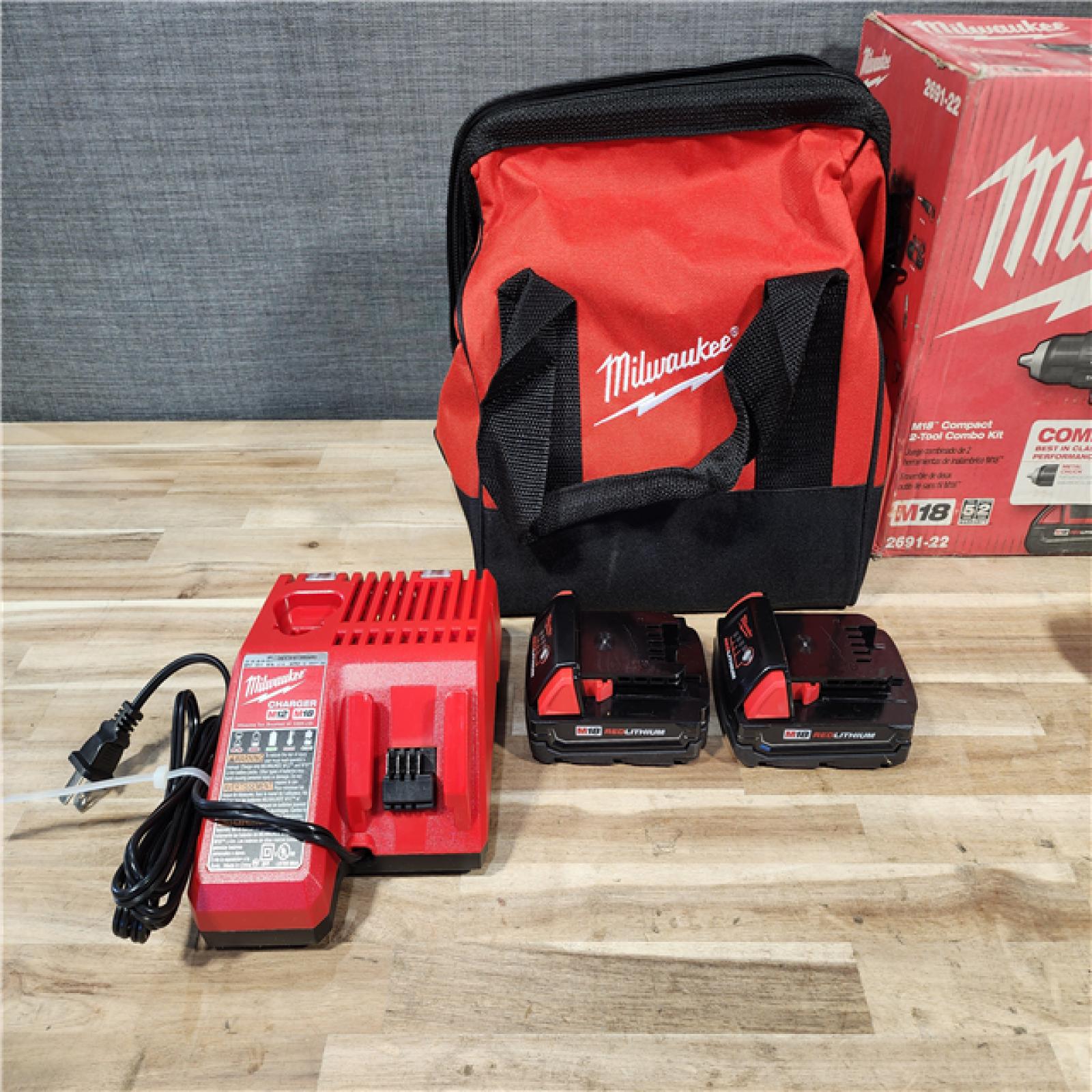 HOUSTON LOCATION - AS-IS Milwaukee 18V Lithium-Ion Cordless Drill Driver/Impact Driver Combo Kit