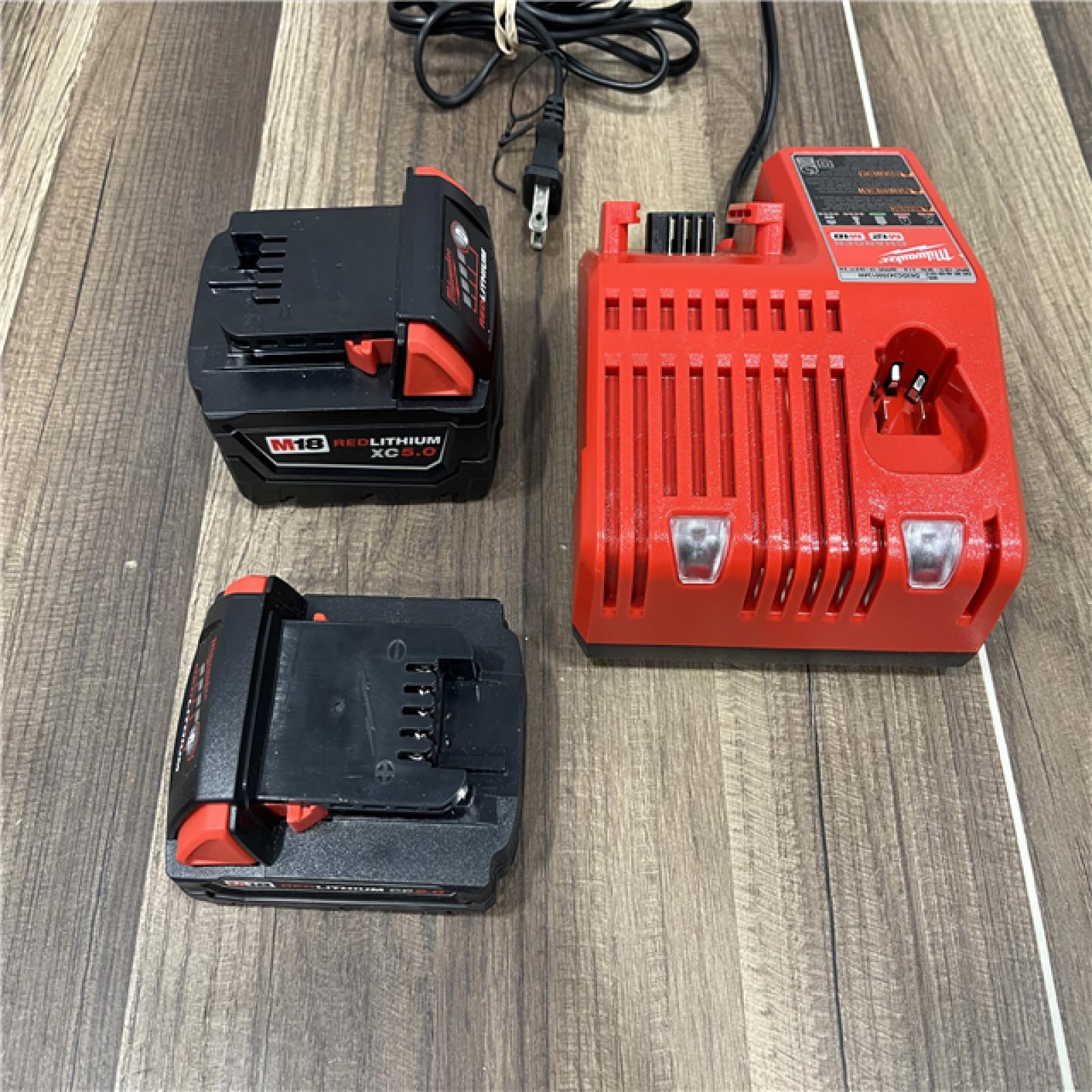 AS-IS Milwaukee M18 18-Volt Lithium-Ion Brushless Cordless Combo Kit (4-Tool) with 2-Batteries, 1-Charger and Tool Bag