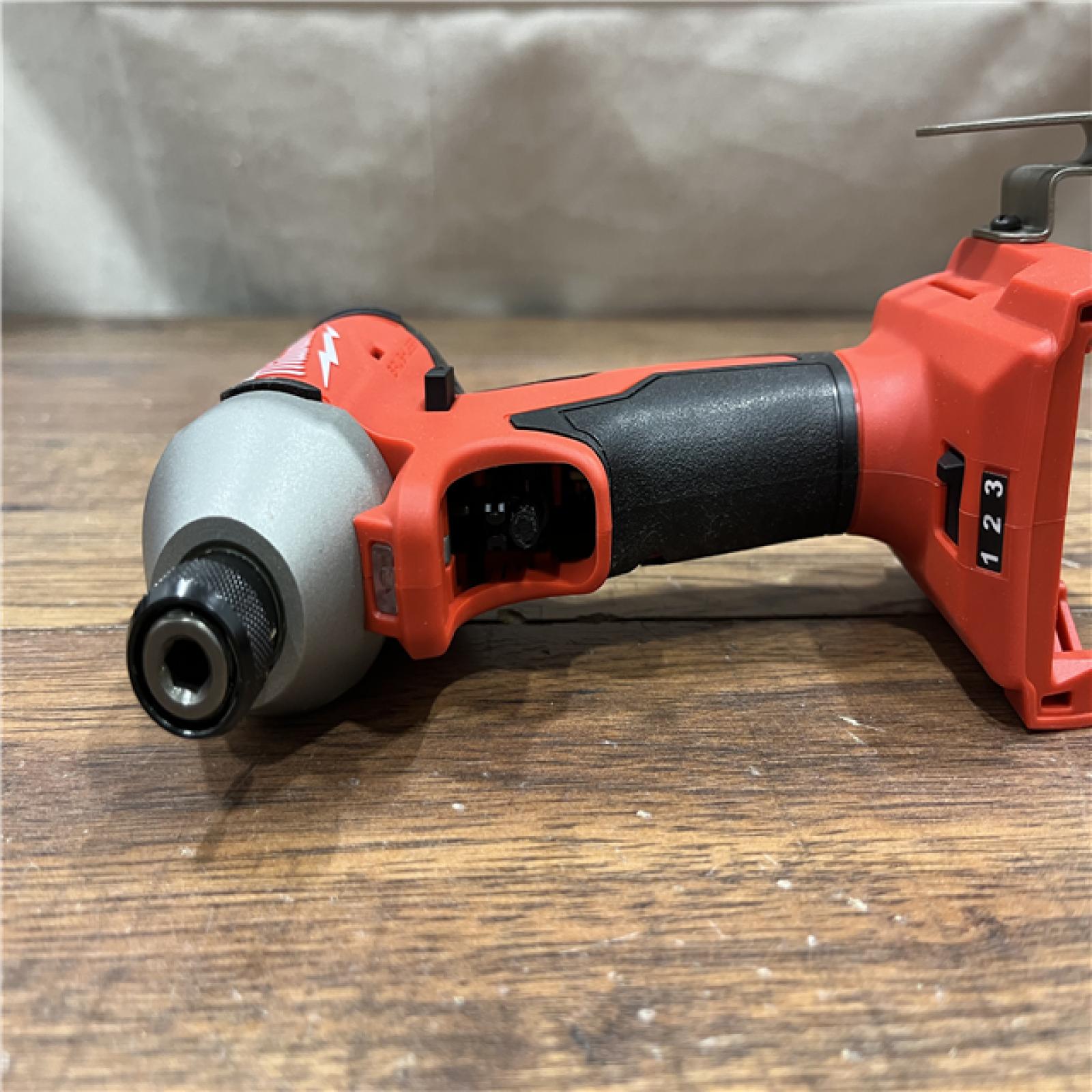 AS-IS Milwaukee M18 18-Volt Lithium-Ion Brushless Cordless Combo Kit (4-Tool) with 2-Batteries, 1-Charger and Tool Bag