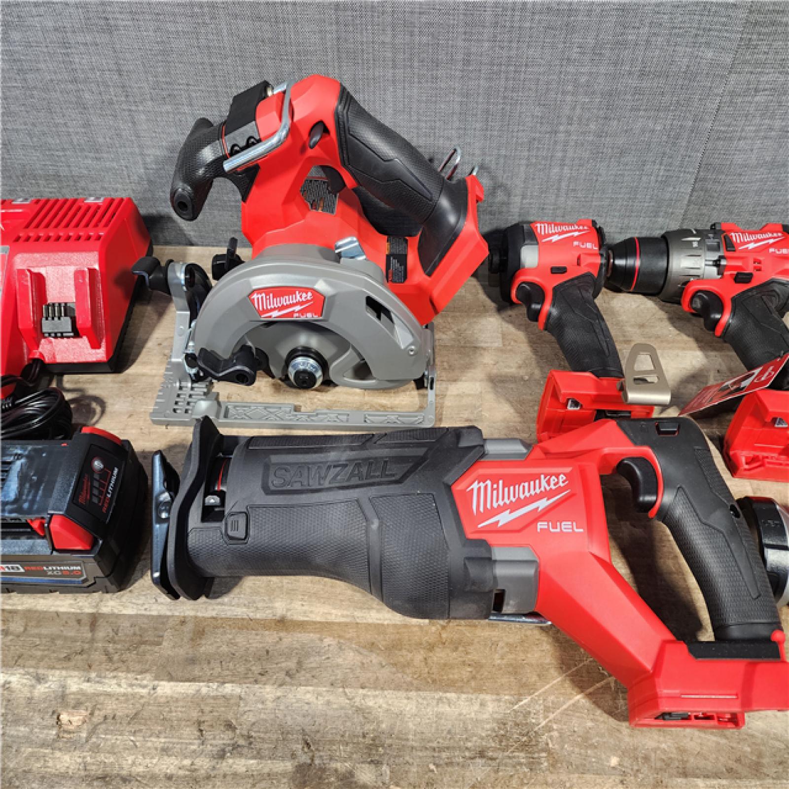 HOUSTON LOCATION - AS-IS M18 FUEL 18V Lithium-Ion Brushless Cordless 5-Tool Combo Kit with Two 5.0 Ah Batteries  1 Charger 1 Tool Bag