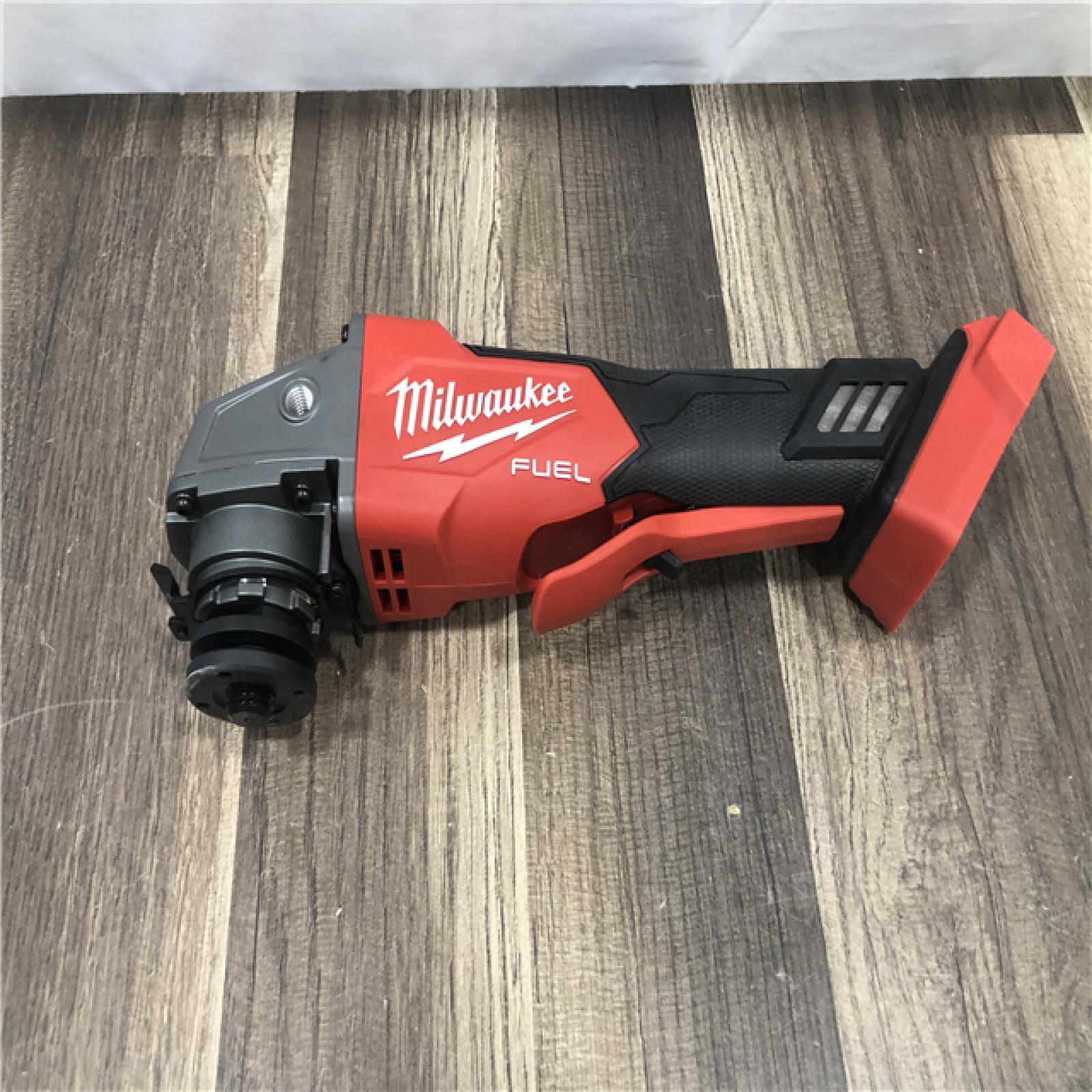 AS-IS Milwaukee  FUEL 18V Lithium-Ion Brushless Cordless 4-1/2 in./5 in. Grinder w/Paddle Switch (Tool-Only)