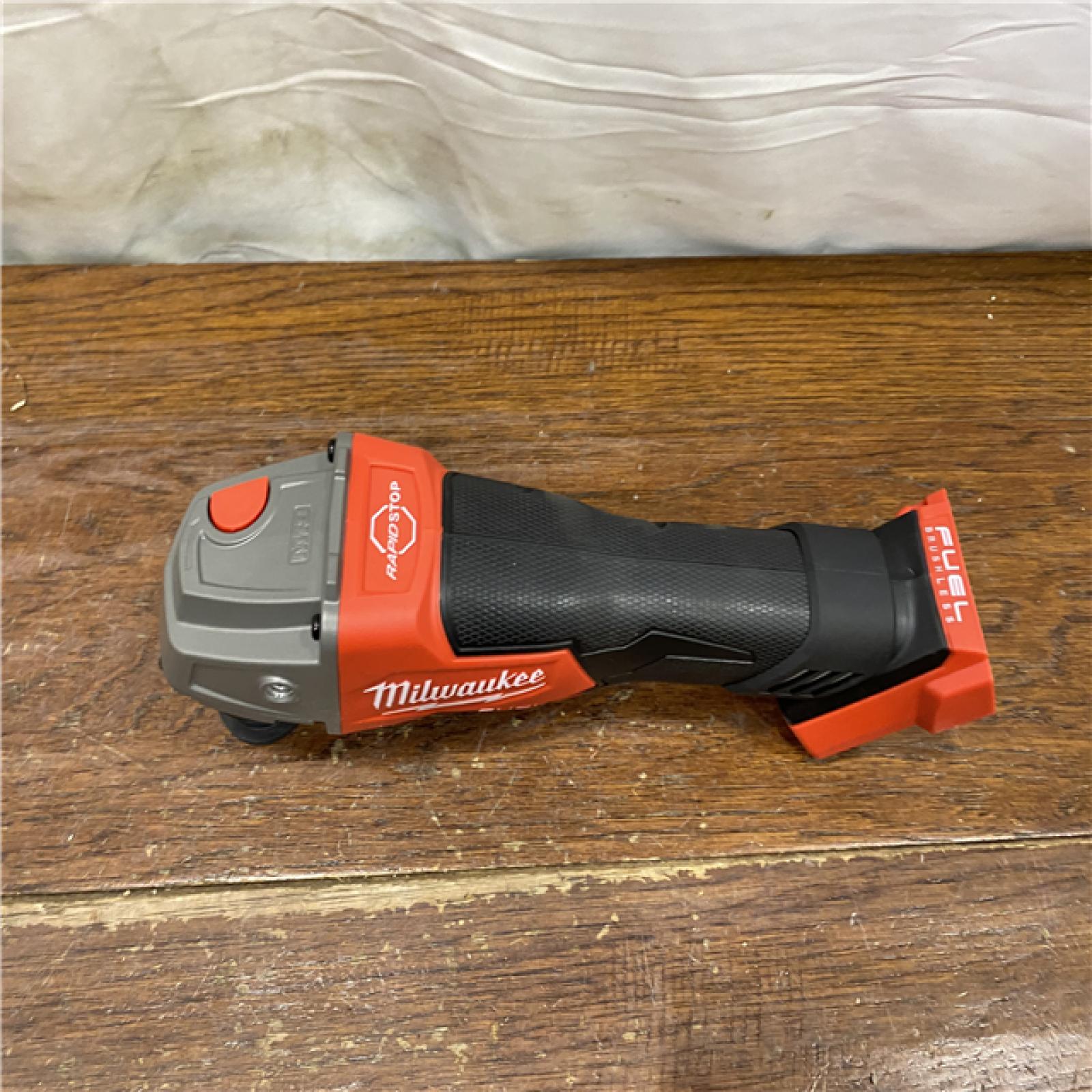 AS-IS Milwaukee 2880-20 FUEL 18-Volt Lithium-Ion Brushless Cordless 4-1/2 in./5 in. Grinder W/Paddle Switch (Tool-Only)