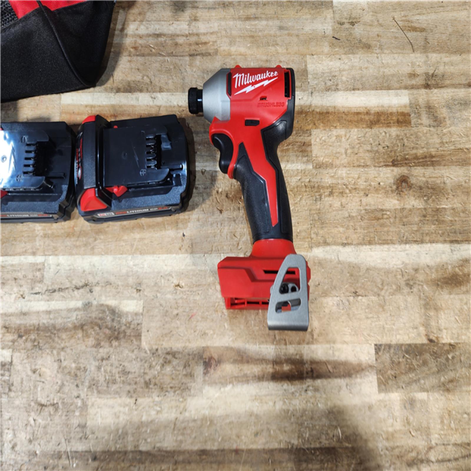 HOUSTON LOCATION - AS - IS Milwaukee 18-Volt Lithium-Ion Compact Brushless Cordless 1/4 in. Impact Driver Kit