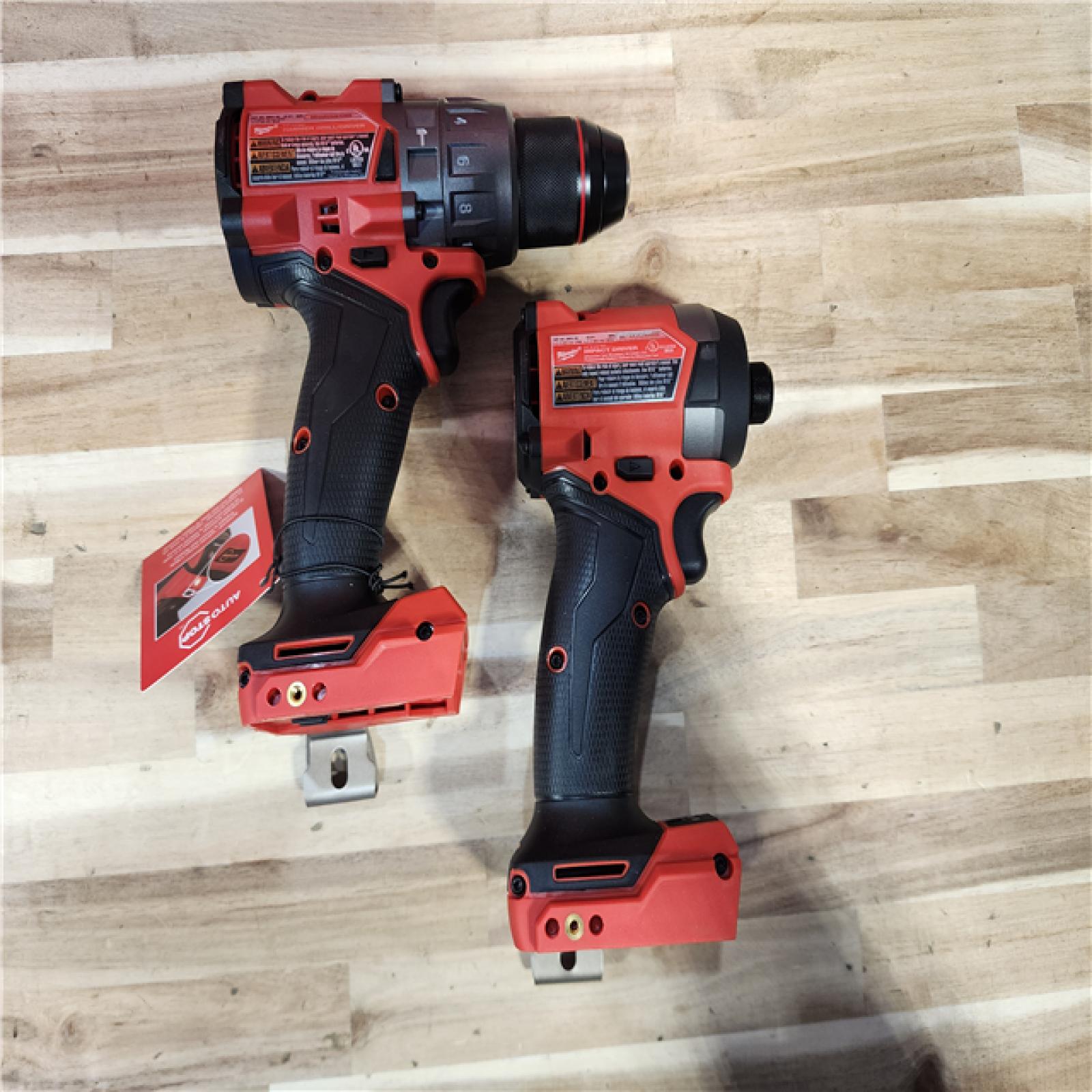 HOUSTON LOCATION - AS-IS (APPEARS LIKE NEW) Milwaukee  FUEL 18V Lithium-Ion Brushless Cordless Hammer Drill and Impact Driver Combo Kit