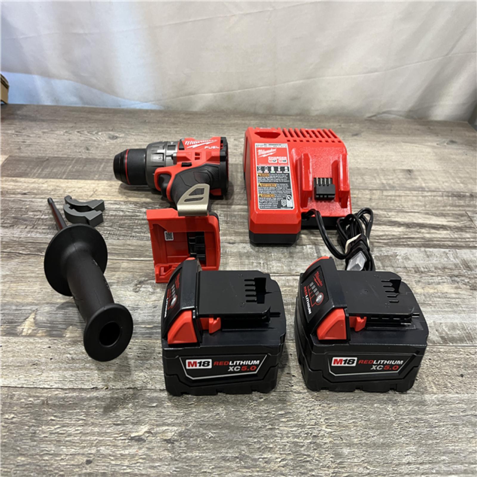 AS-IS Milwaukee FUEL 18V Lithium-Ion Brushless Cordless 1/2 in. Hammer Drill Driver Kit