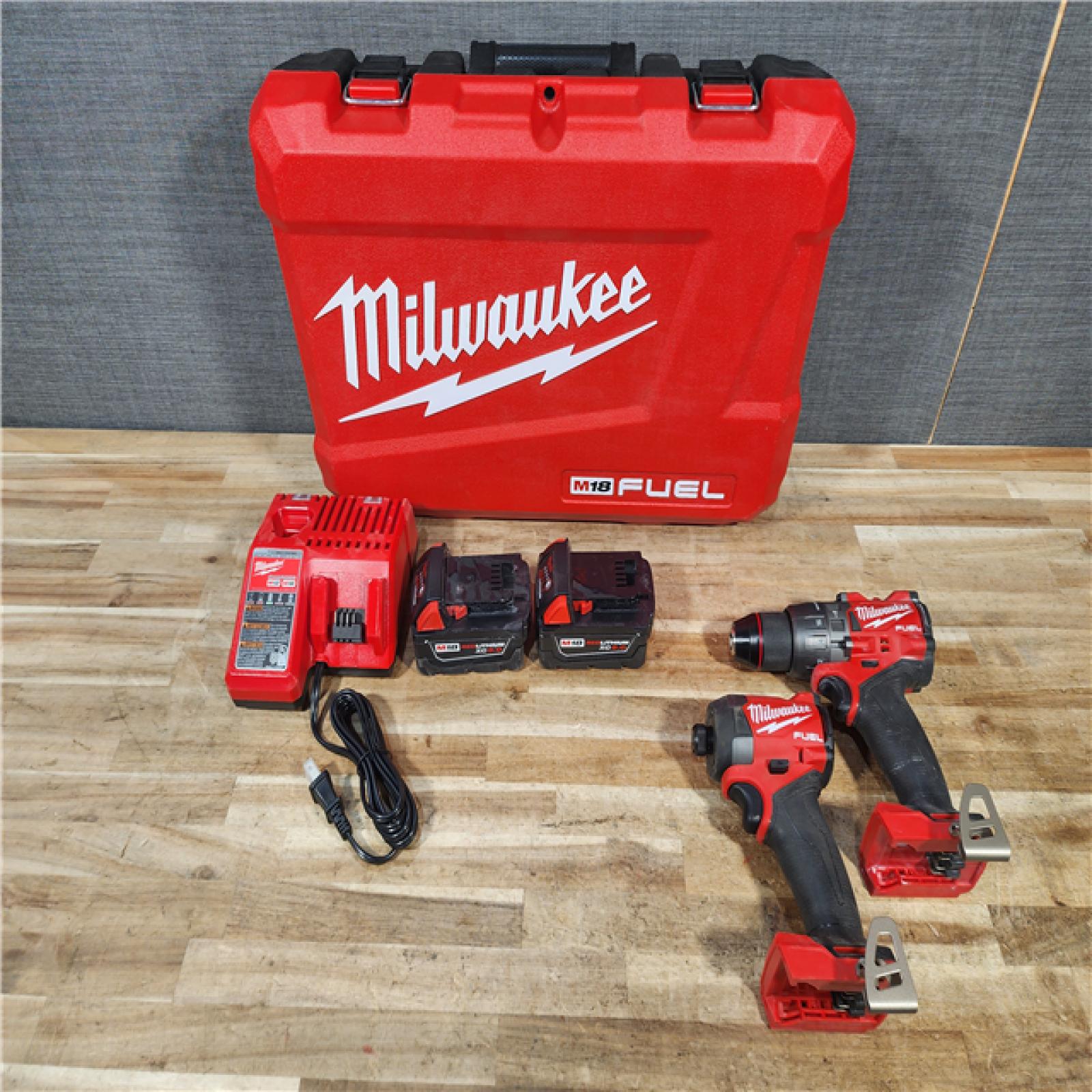 HOUSTON LOCATION - AS - IS Milwaukee FUEL 18V Lithium-Ion Brushless Cordless Hammer Drill and Impact Driver Combo Kit