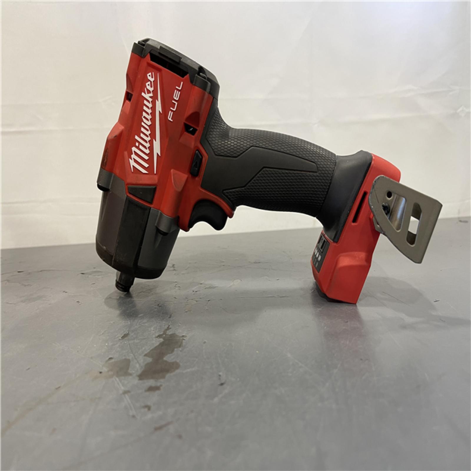 AS-IS - Milwaukee M18 18V Fuel 1/2 Mid-Torque Impact Wrench Cordless Lithium-Ion Brushless W/ Friction Ring