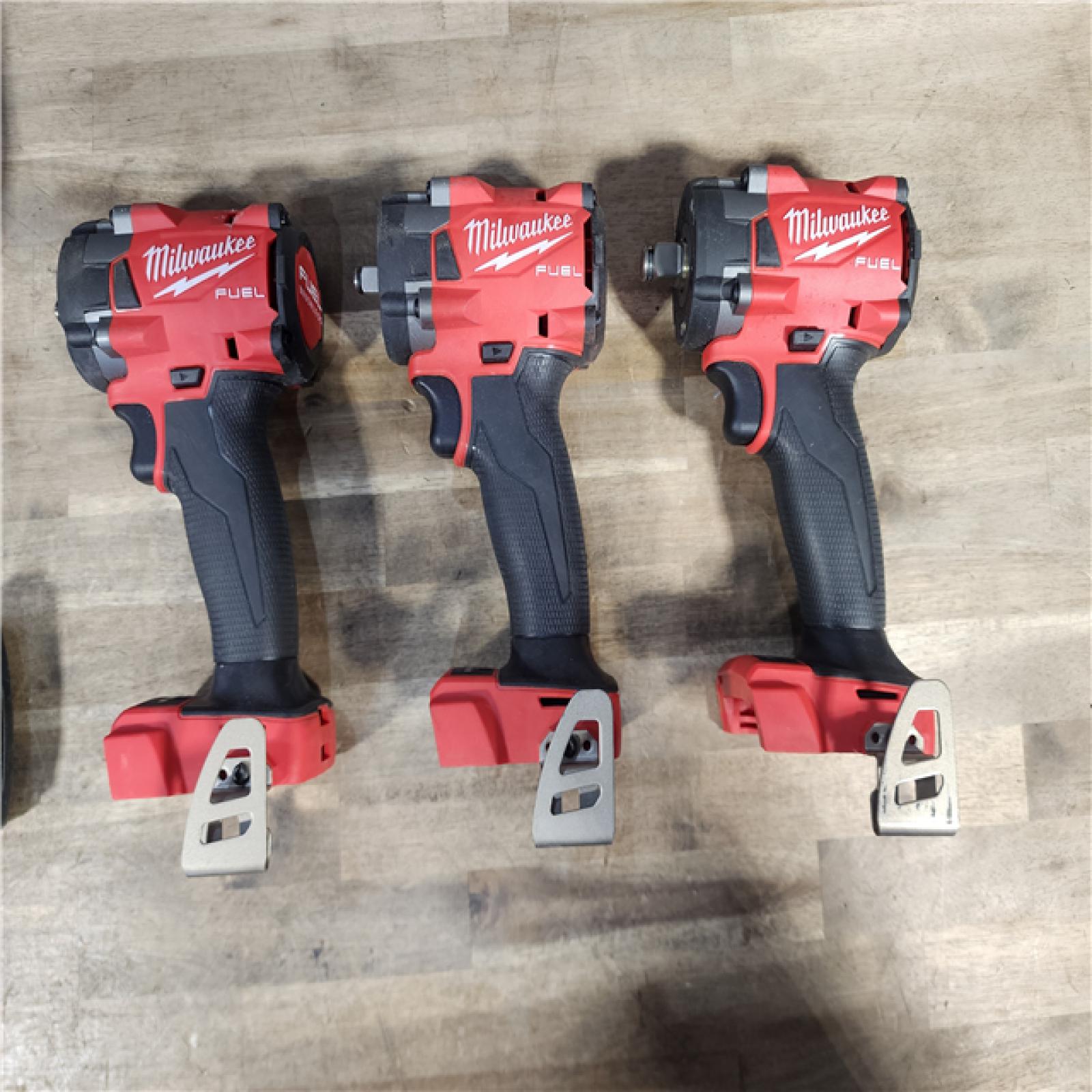 HOUSTON LOCATION - AS-IS MILWAUKEE 3 TOOL COMBO KIT W/ (2) BATTERY & CHARGER