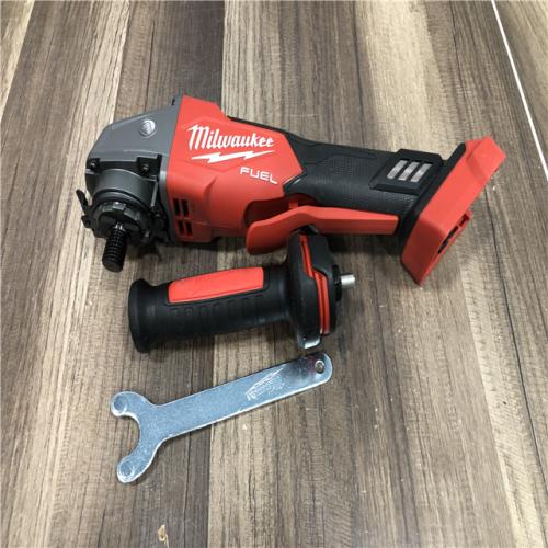 AS-IS Milwaukee FUEL 18V Lithium-Ion Brushless Cordless 4-1/2 in./5 in. Grinder w/Paddle Switch (Tool-Only)