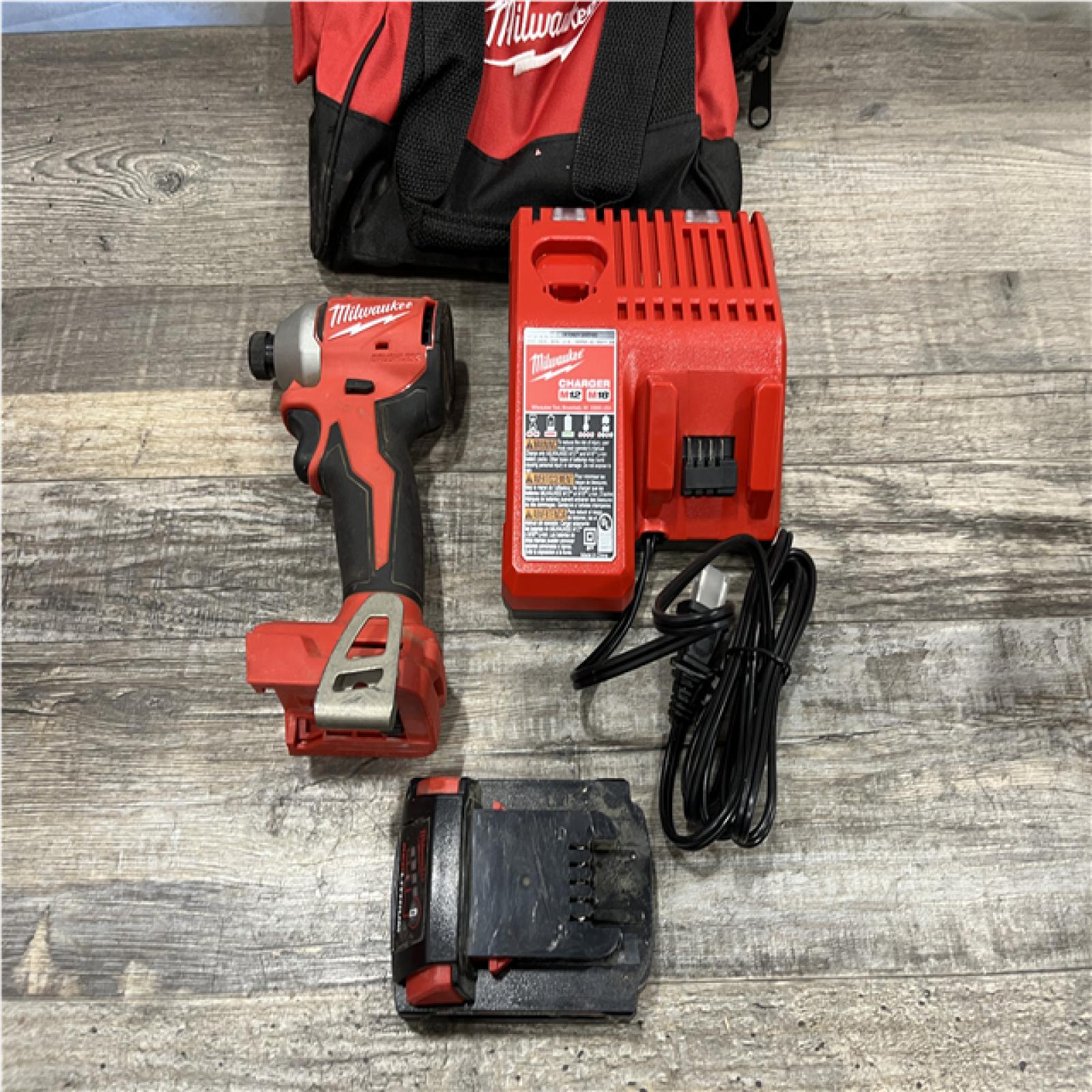 AS-IS Milwaukee 18-Volt Lithium-Ion Compact Brushless Cordless 1/4 in. Impact Driver Kit