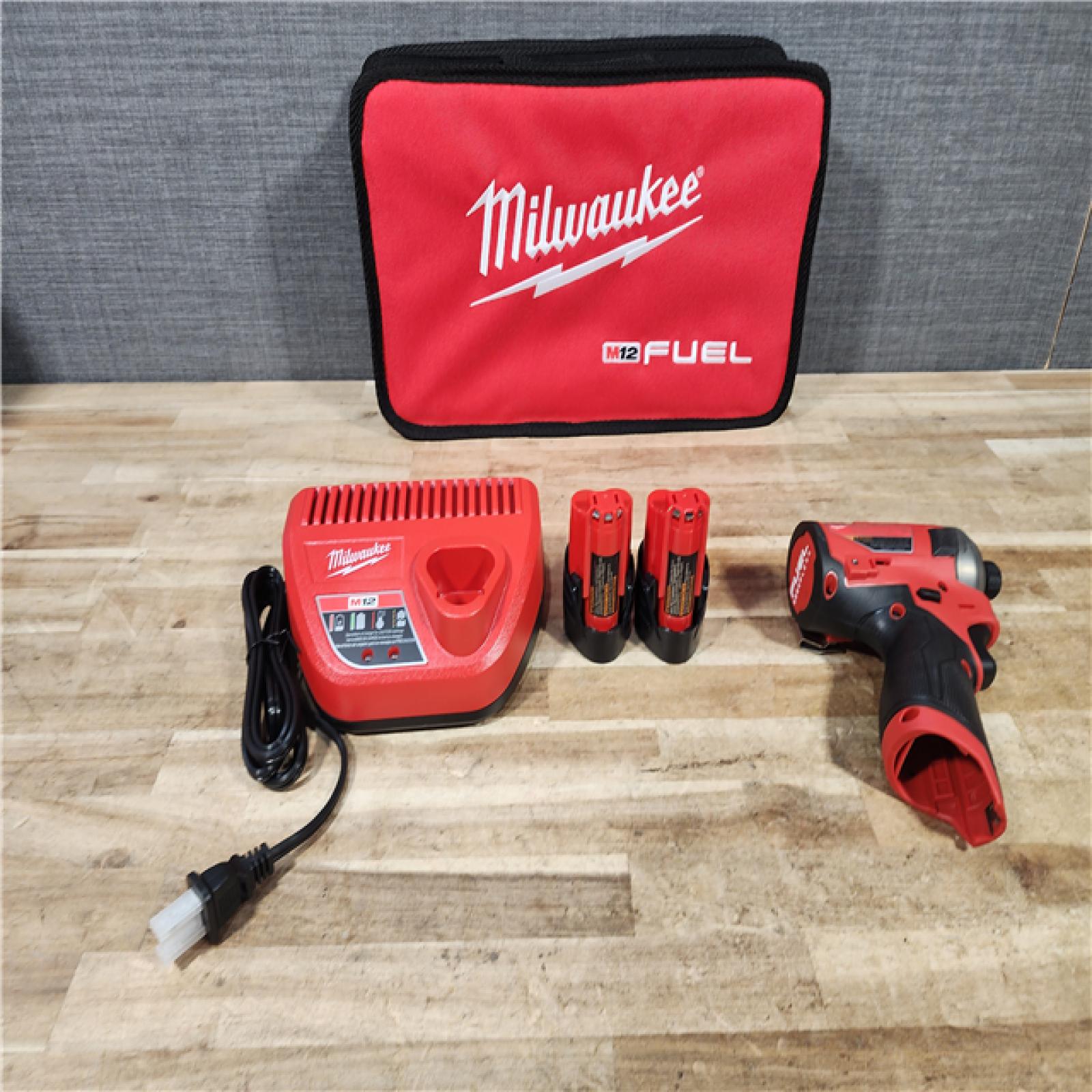 HOUSTON LOCATION - AS - IS Milwaukee FUEL SURGE 12V Lithium-Ion Brushless Cordless 1/4 in. Hex Impact Driver Compact Kit
