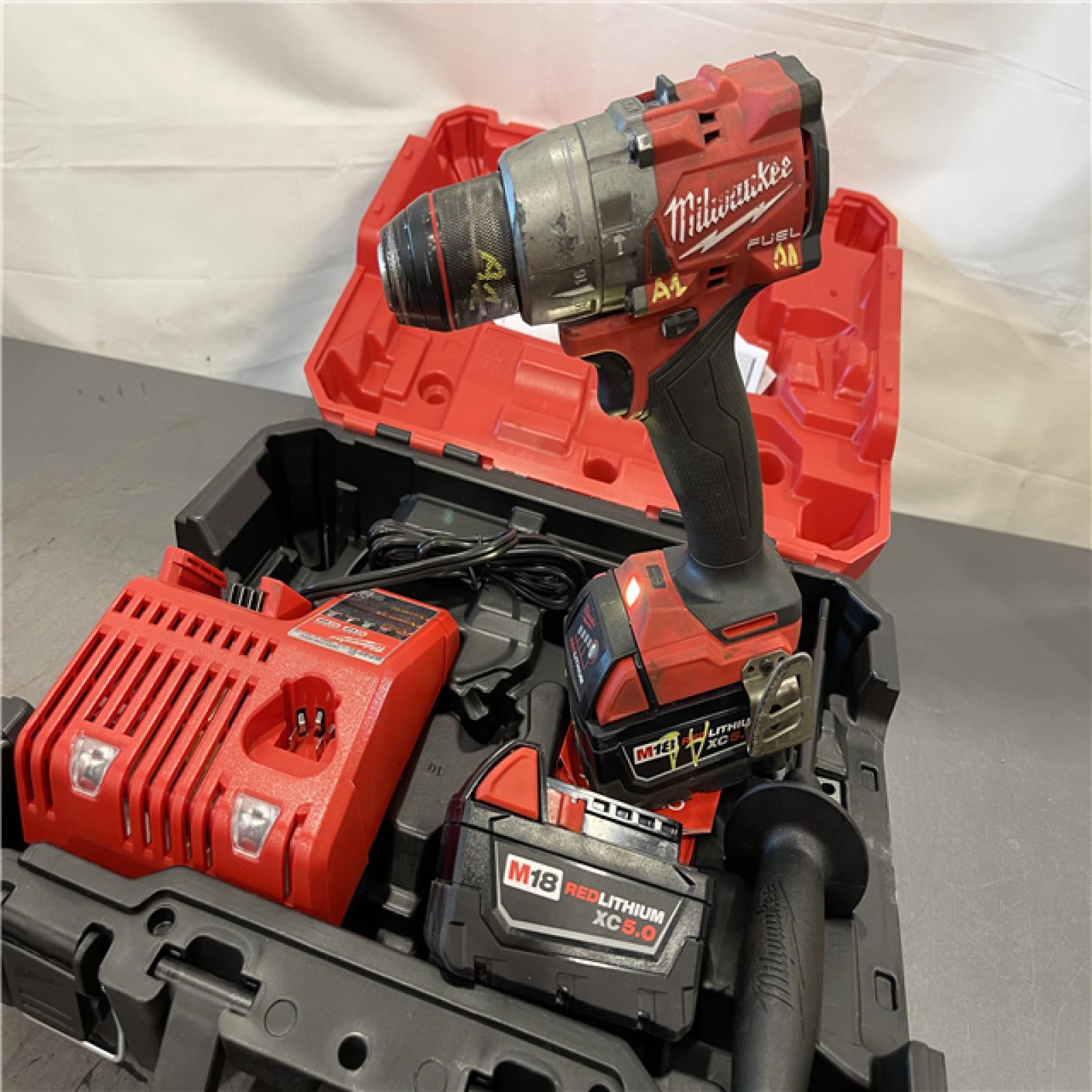 AS-IS - Milwaukee M18 FUEL 18V Lithium-Ion Brushless Cordless 1/2 in. Hammer Drill Driver Kit
