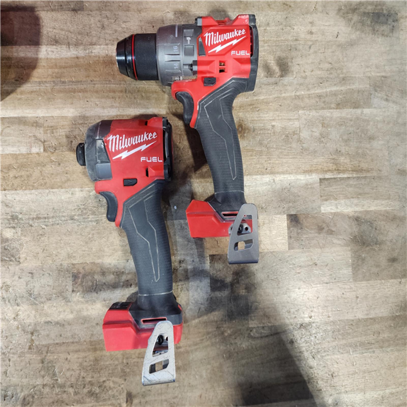 HOUSTON LOCATION - AS-IS Milwaukee FUEL 18V Lithium-Ion Brushless Cordless Hammer Drill and Impact Driver Combo Kit