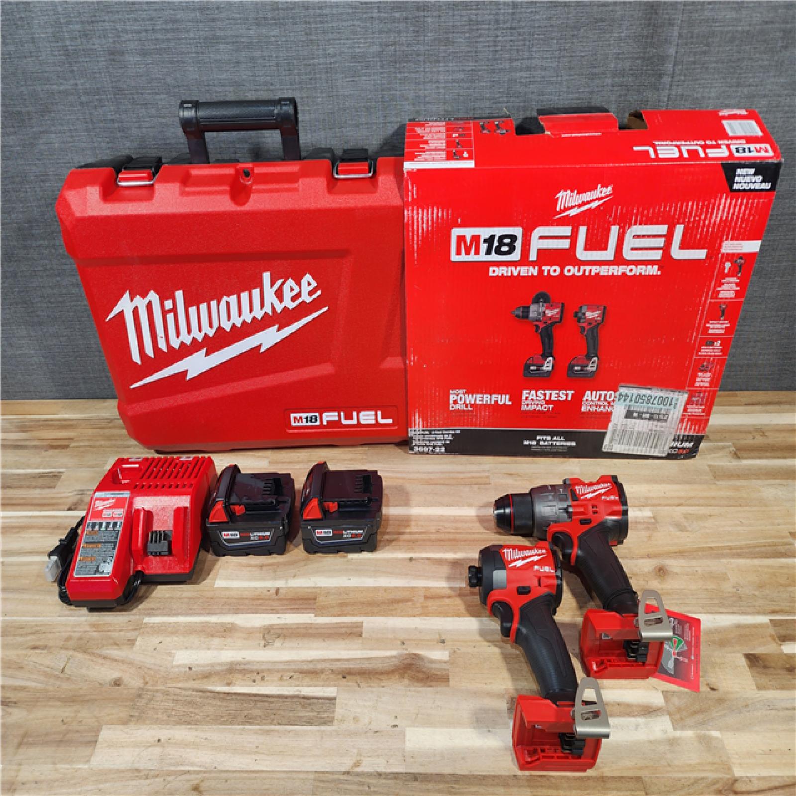 HOUSTON LOCATION - AS-IS (APPEARS LIKE NEW) Milwaukee  FUEL 18V Lithium-Ion Brushless Cordless Hammer Drill and Impact Driver Combo Kit