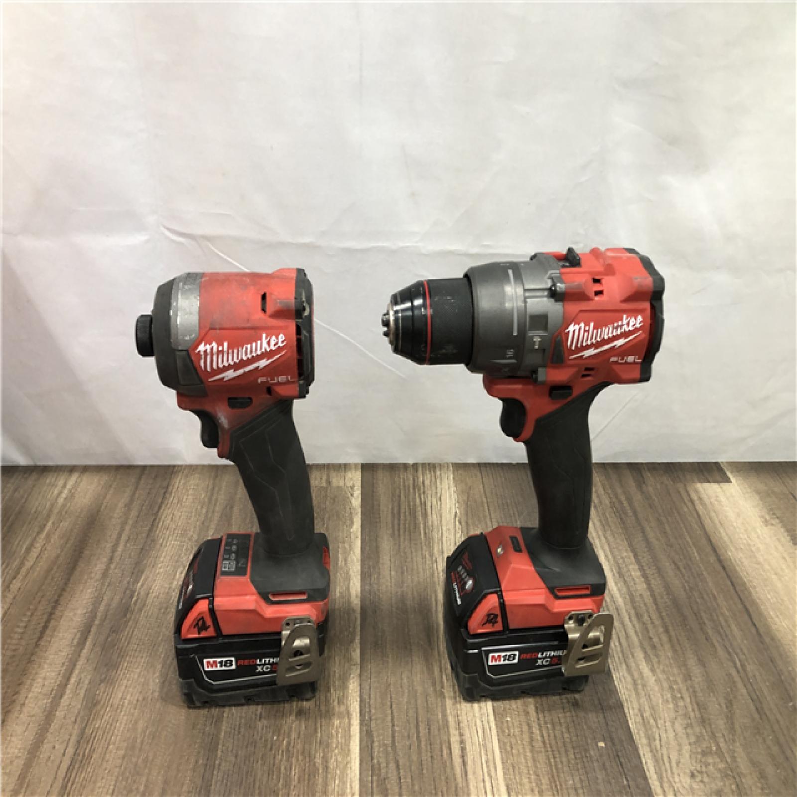 AS-IS Milwaukee FUEL 18V Lithium-Ion Brushless Cordless Hammer Drill and Impact Driver Combo Kit