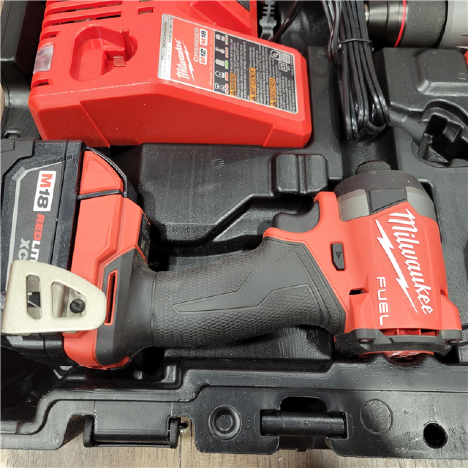 AS-IS MILWAUKEE M18 FUEL 18V Lithium-Ion Brushless Cordless Hammer Drill and Impact Driver Combo Kit (2-Tool) with 2 Batteries