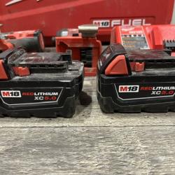 AS-IS Milwaukee FUEL 18V Lithium-Ion Brushless Cordless Hammer Drill and Impact Driver Combo Kit