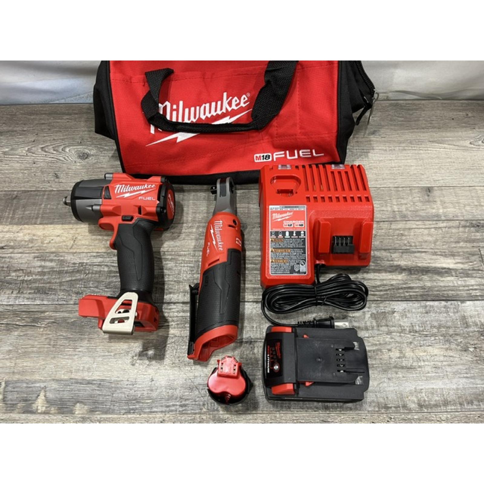 AS-IS Milwaukee FUEL 18V Cordless Mid Torque 1/2 in. Impact Wrench w/ 12 FUEL 3/8 in. Ratchet Combo Kit