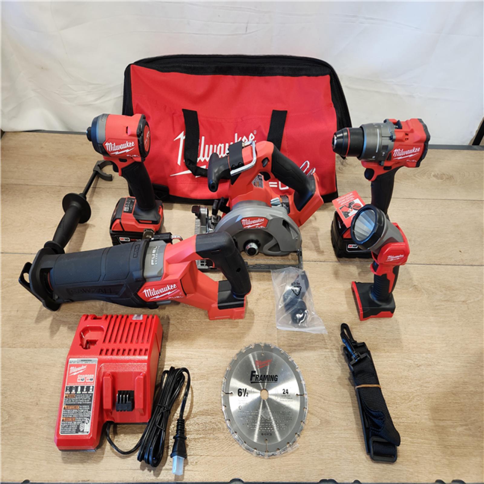 AS-IS- M18 FUEL 18V Lithium-Ion Brushless Cordless Combo Kit (5-Tool) with Two 5.0 Ah Batteries  1 Charger 1 Tool Bag