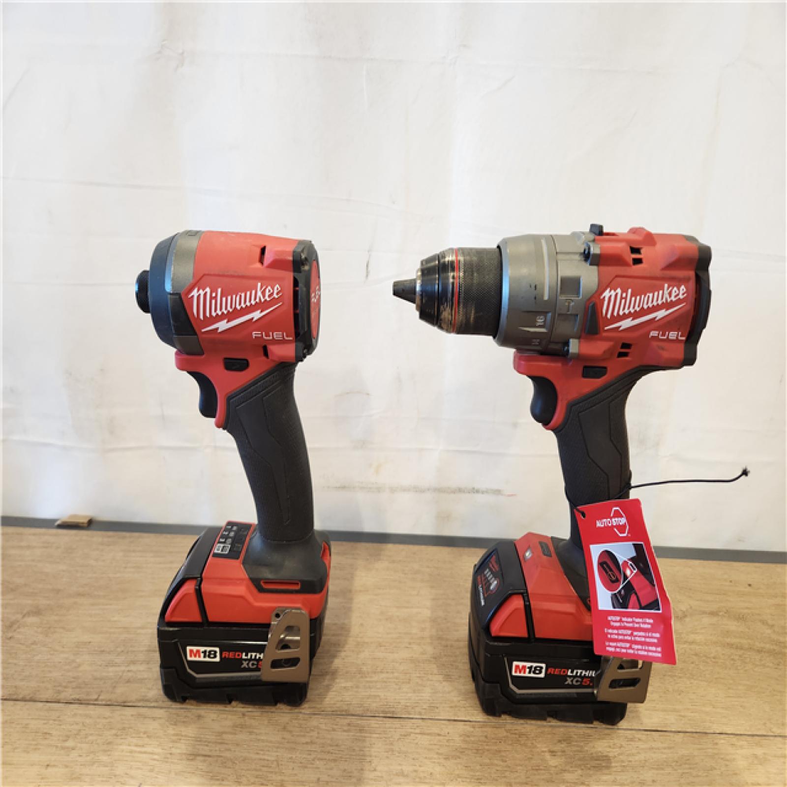 AS-IS- Milwaukee FUEL 18V Lithium-Ion Brushless Cordless Hammer Drill and Impact Driver Combo Kit