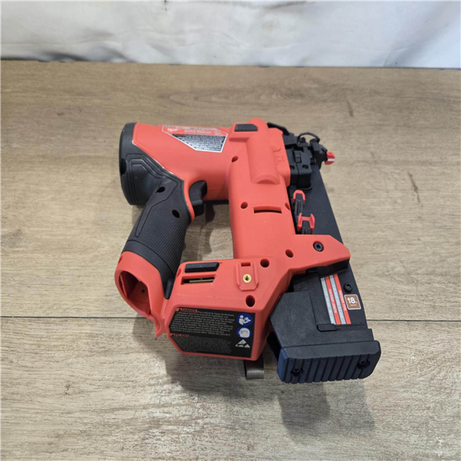 AS-IS Milwaukee FUEL 12V Cordless 18-Gauge 1-1/2 in. Compact Brad Nailer (Tool Only)