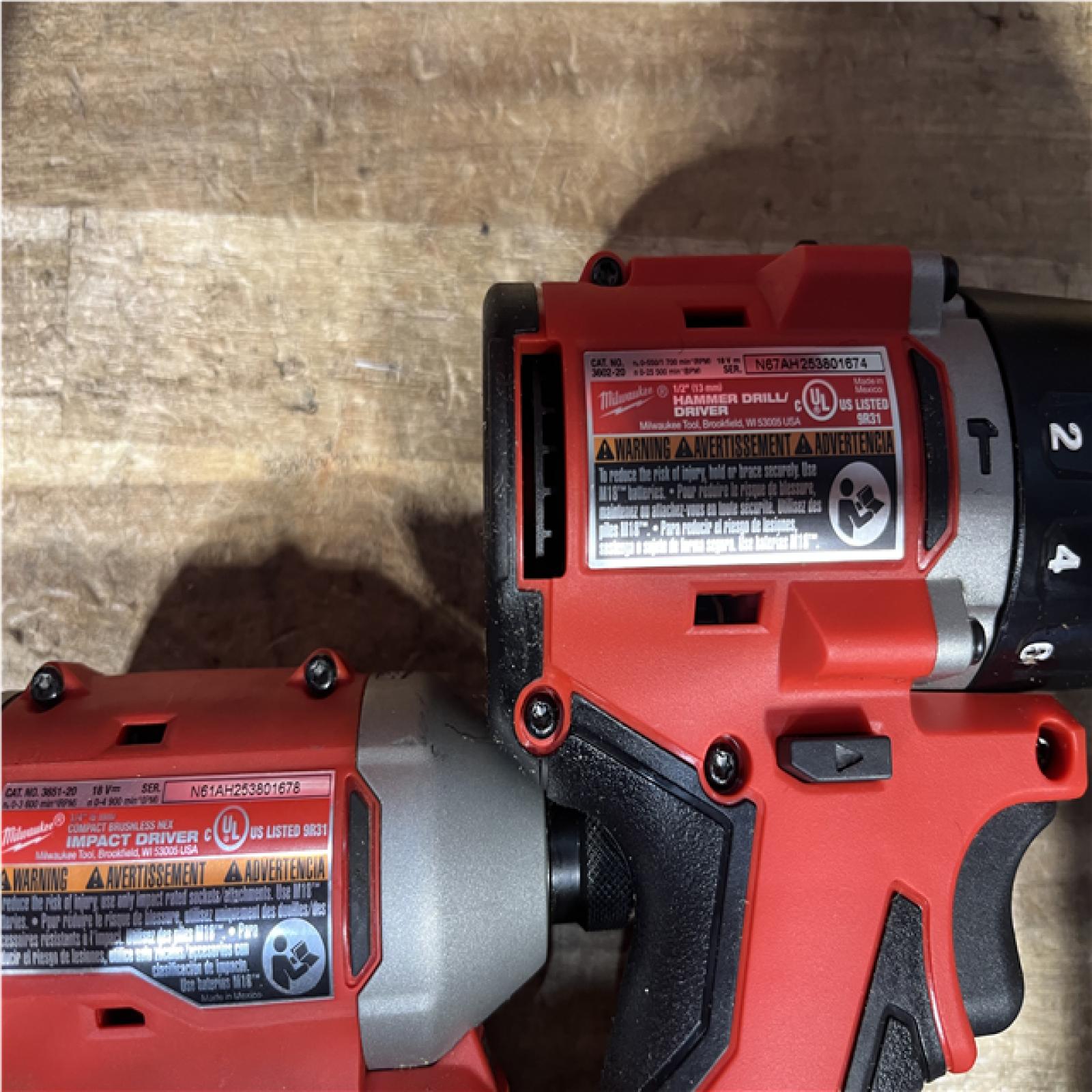 Houston Location AS-IS Milwaukee Hammer Drill Driver and Impact Driver and Batteries QTY/2 with Charger