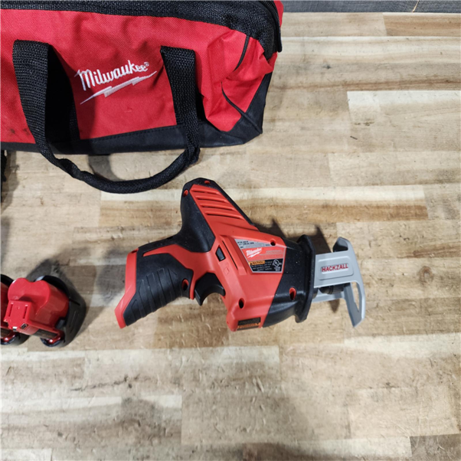 HOUSTON LOCATION - AS - IS Milwaukee M12 12-Volt Lithium-Ion HACKZALL Cordless Reciprocating Saw W/ (2) 1.5Ah Batteries  Charger and Bag