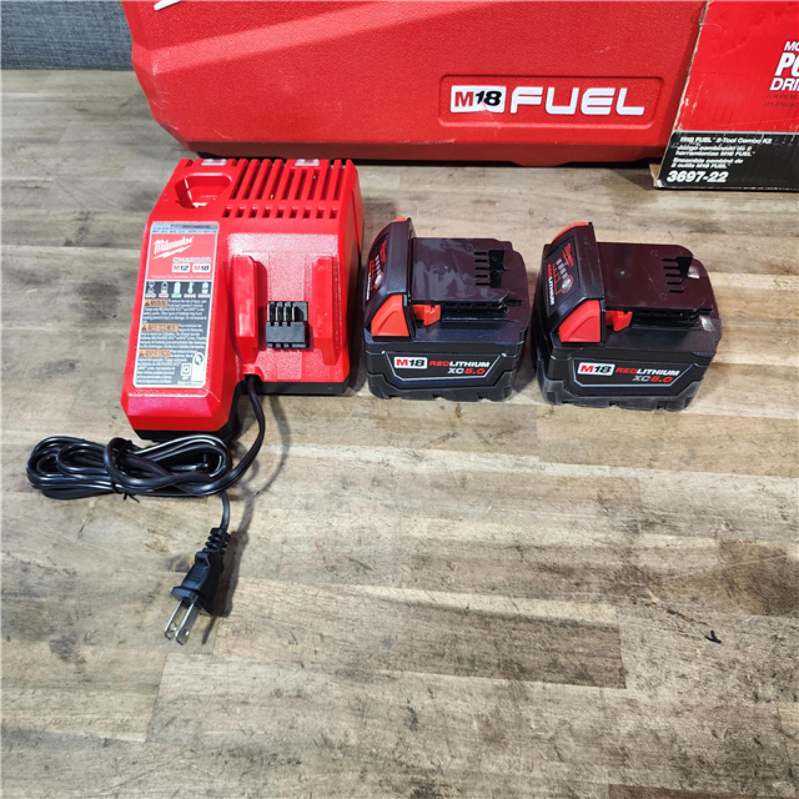 HOUSTON LOCATION - AS-IS MILWAUKEE FUEL 18V Lithium-Ion Brushless Cordless Hammer Drill and Impact Driver Combo Kit