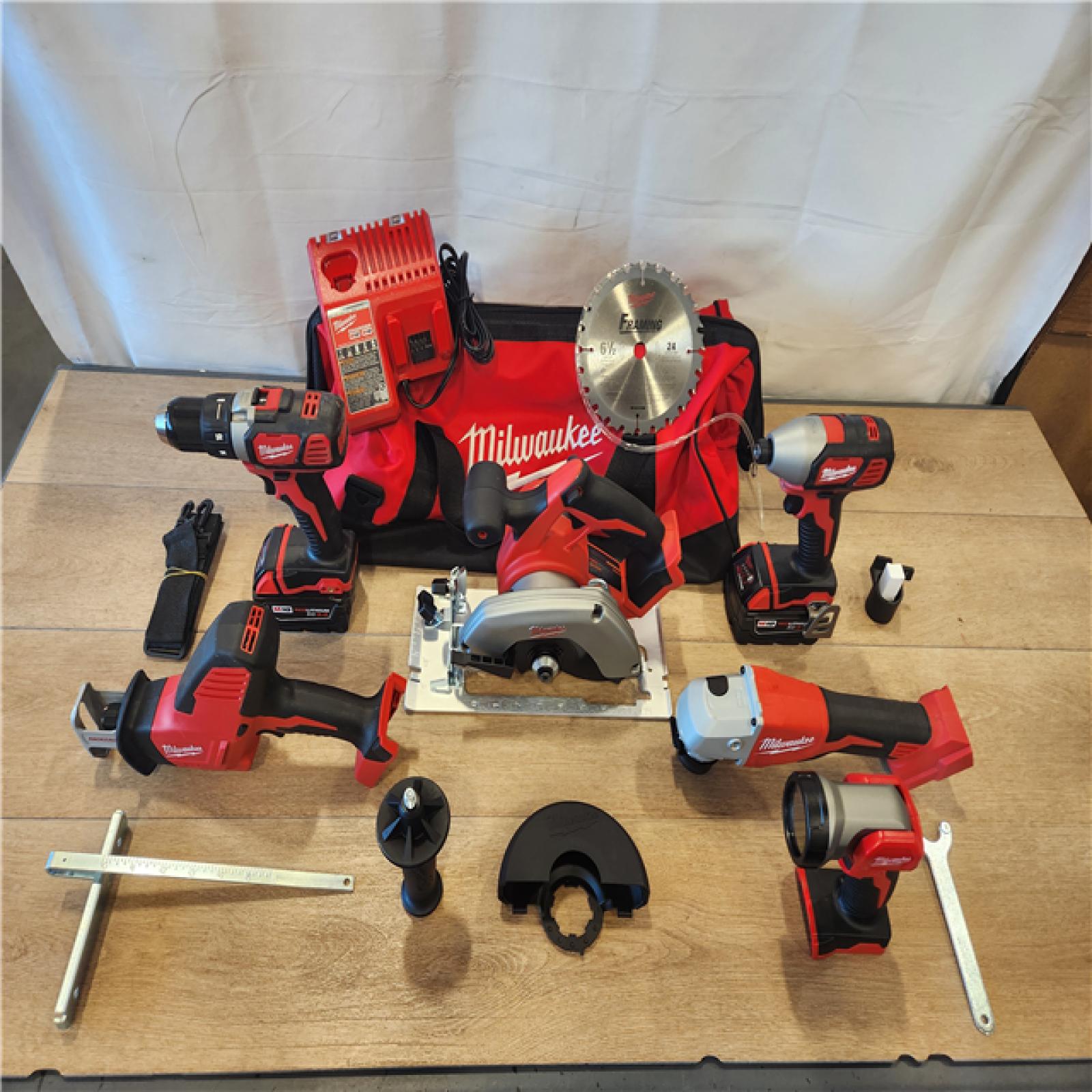 AS-IS- M18 18-Volt Lithium-Ion Cordless Combo Kit 7-Tool with 2-Batteries  Charger and Tool Bag