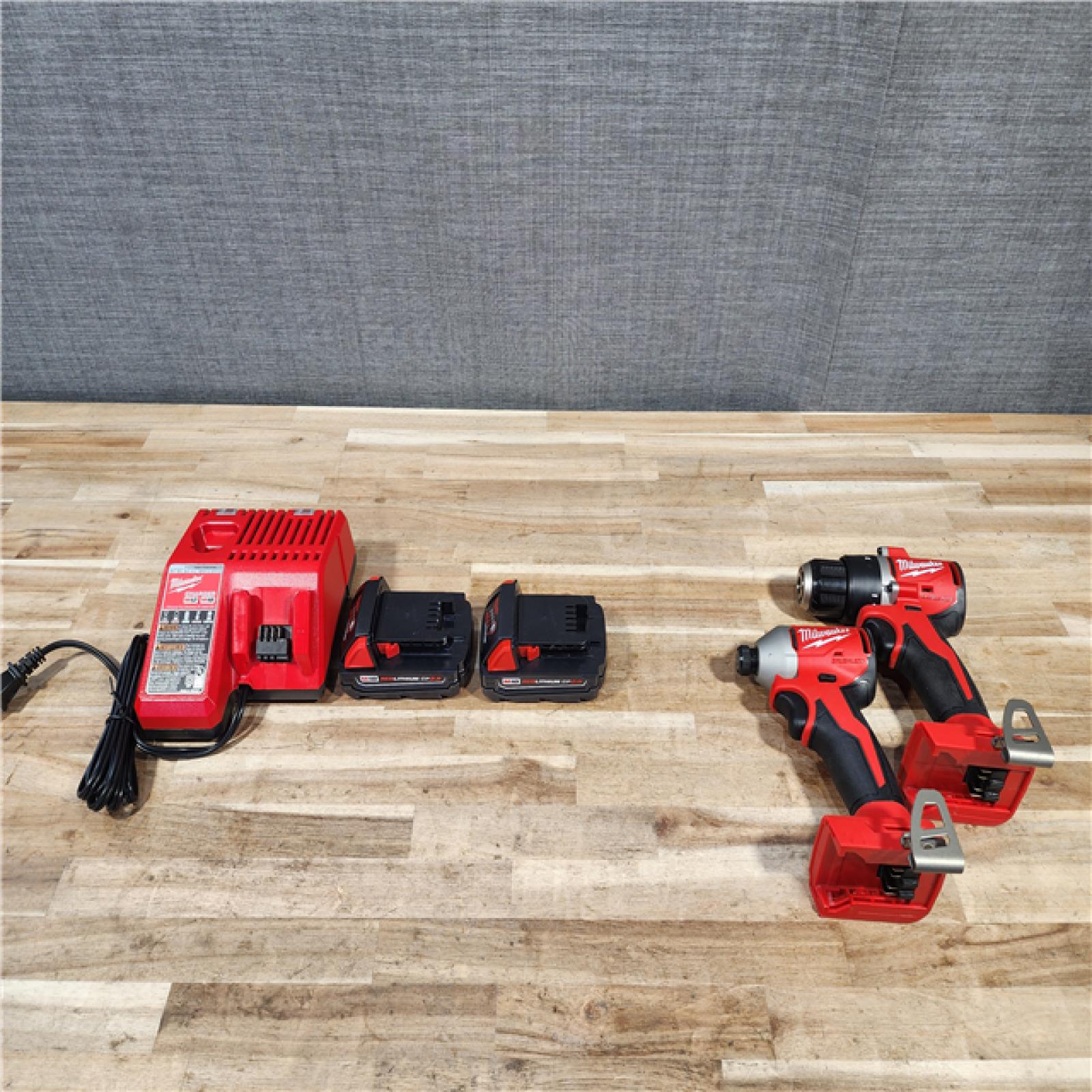 HOUSTON LOCATION - AS-IS MILWAUKEE 2 TOOL COMBO KIT W/ (2) BATTERY & CHARGER