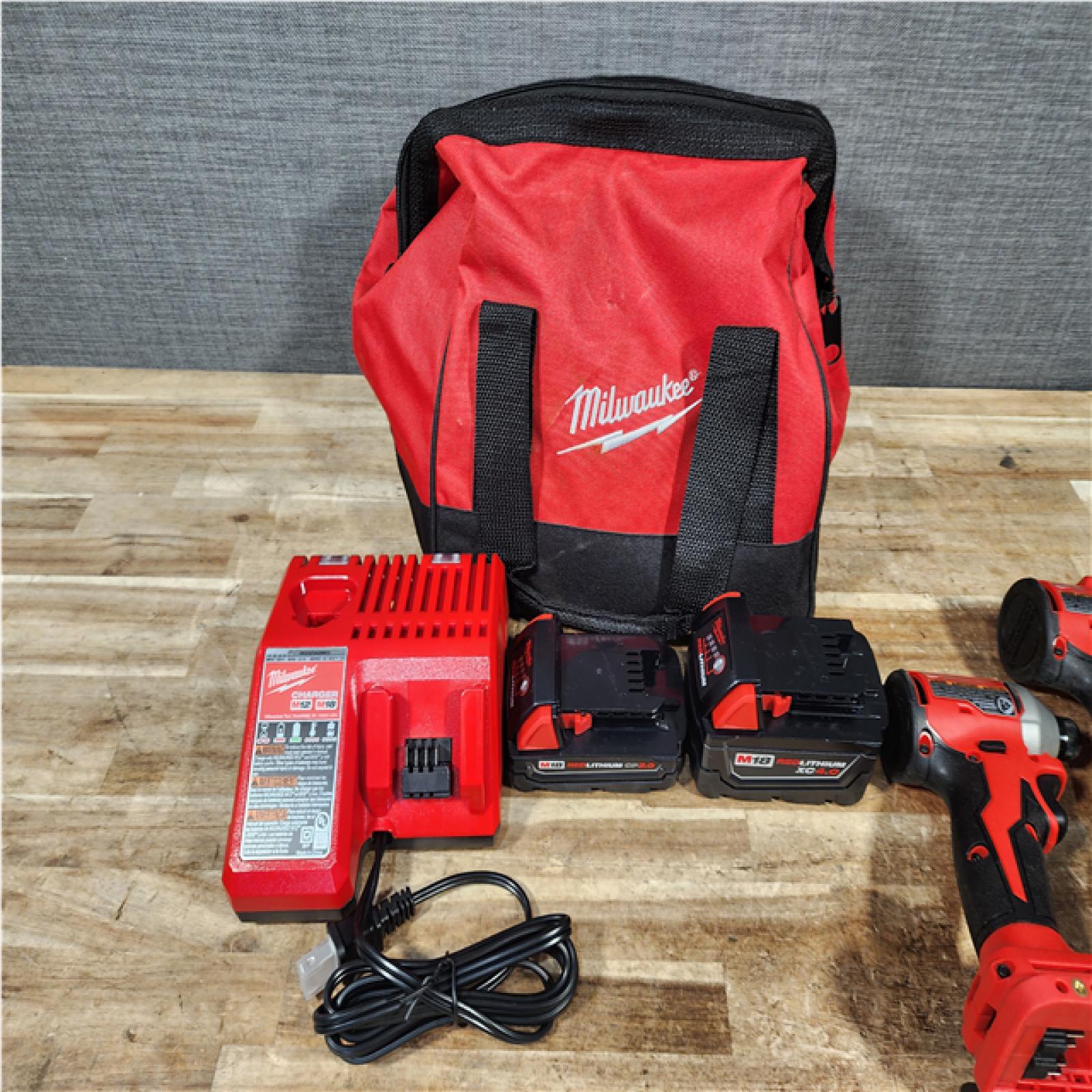 HOUSTON LOCATION - AS - IS Milwaukee 2 Tool Combo Kit W/ (2) Battery & Charger