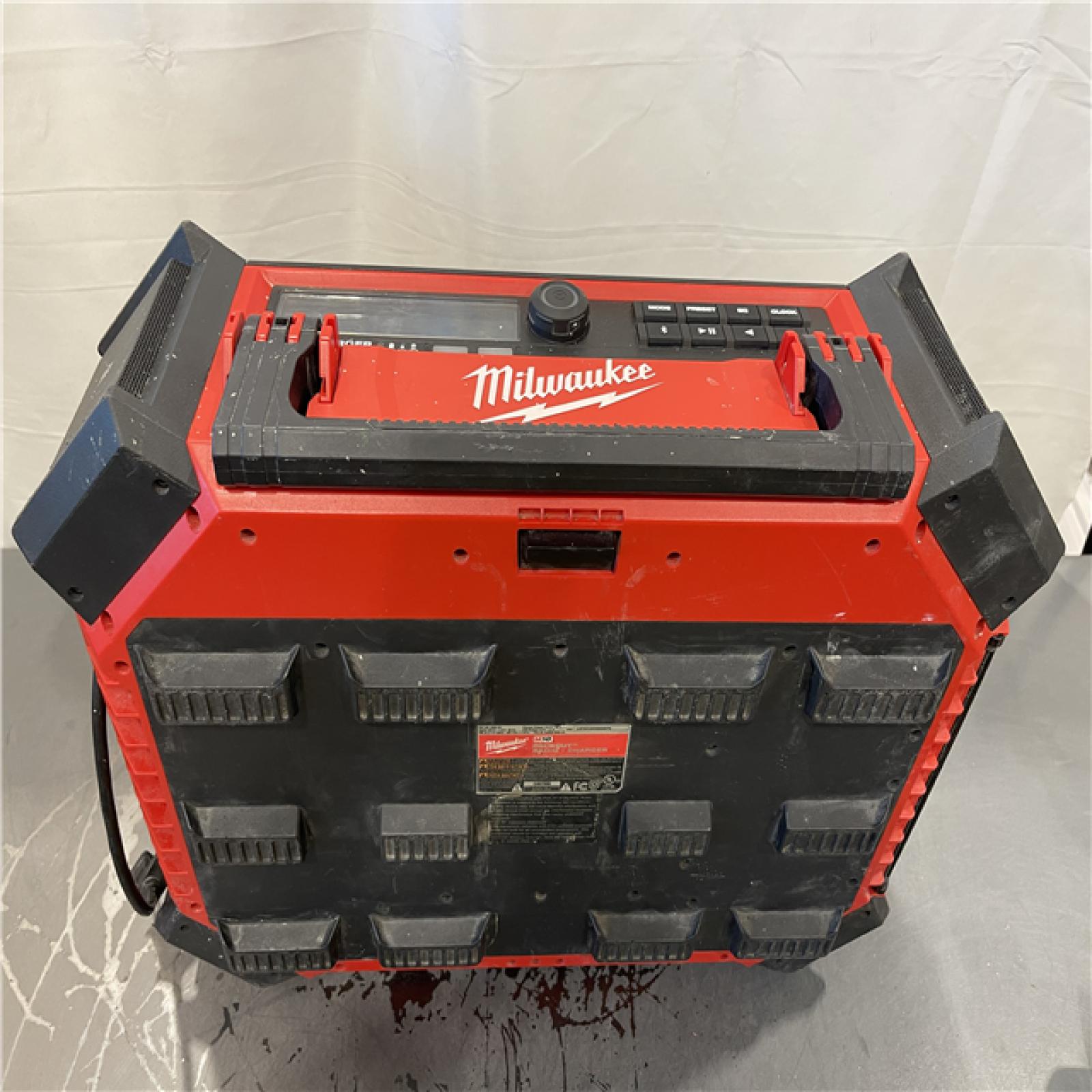 AS-IS - Milwaukee M18 Lithium-Ion Cordless PACKOUT Radio/Speaker with Built-In Charger