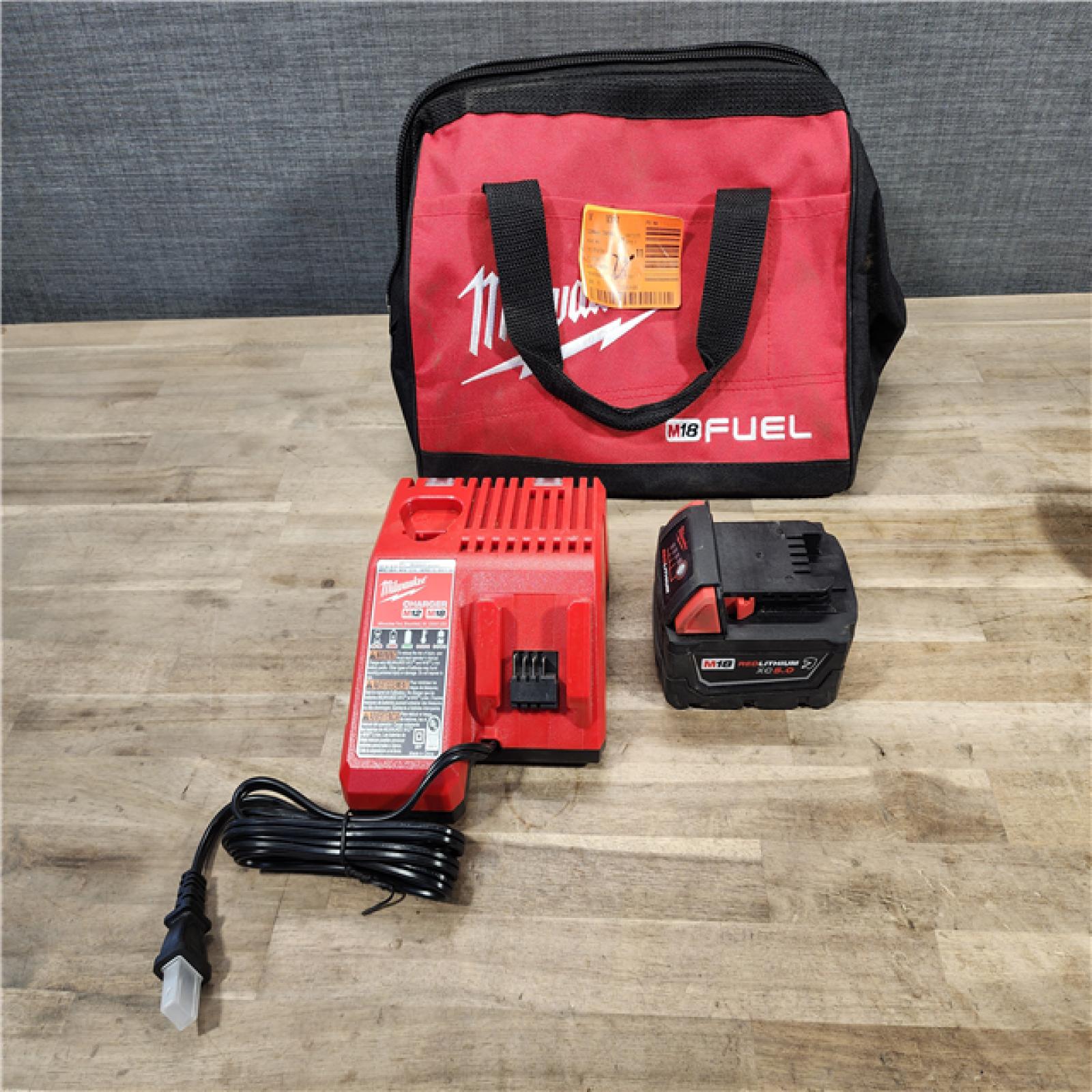 HOUSTON LOCATION - AS-IS Milwaukee M18 1/2 in. Cordless Brushless High Torque Impact Wrench Kit (Battery & Charger)