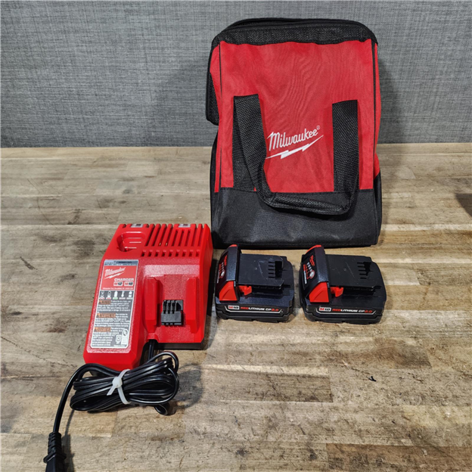 HOUSTON LOCATION - AS-IS Milwaukee M18 18V Lithium-Ion Brushless Cordless Compact Drill/Impact Combo Kit (2-Tool) W/(2) 2.0 Ah Batteries  Charger & Bag